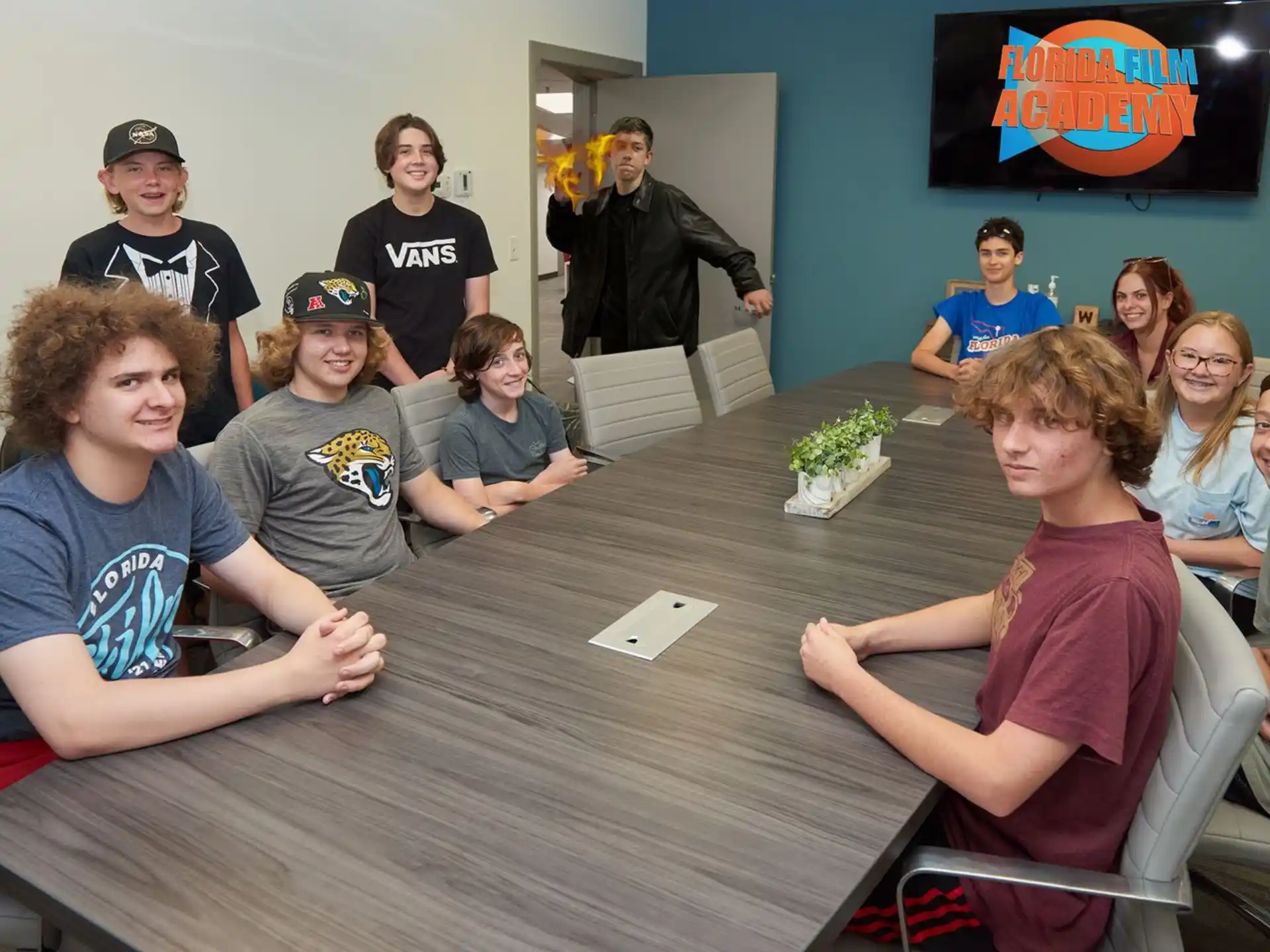 a group of people sitting around a table
