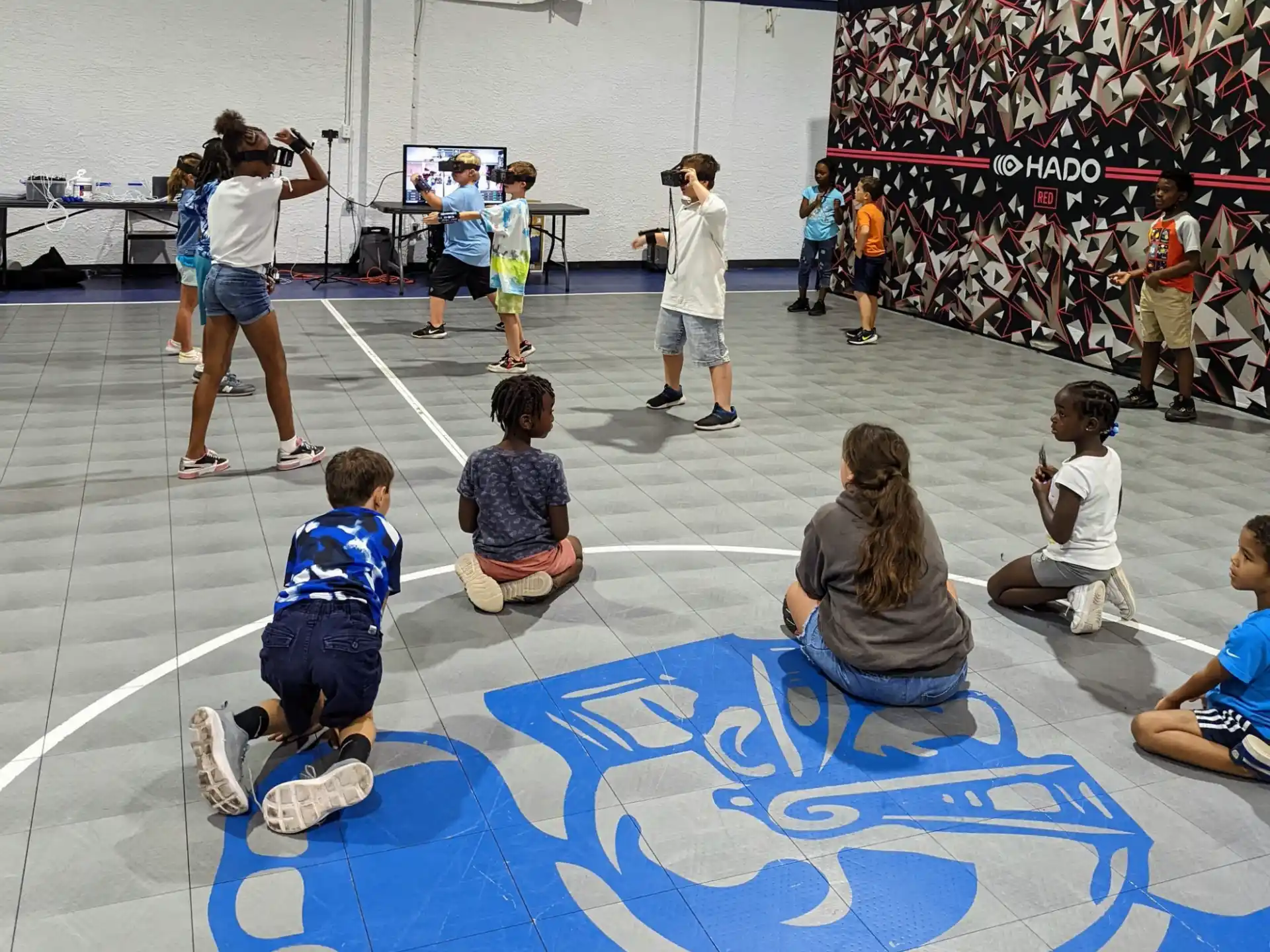 a group of kids playing basketball