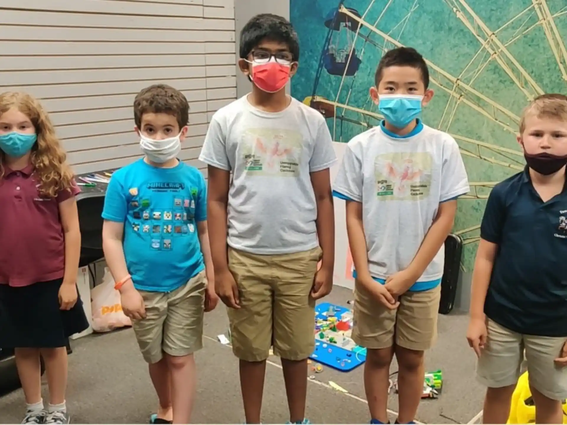 a group of children wearing face masks