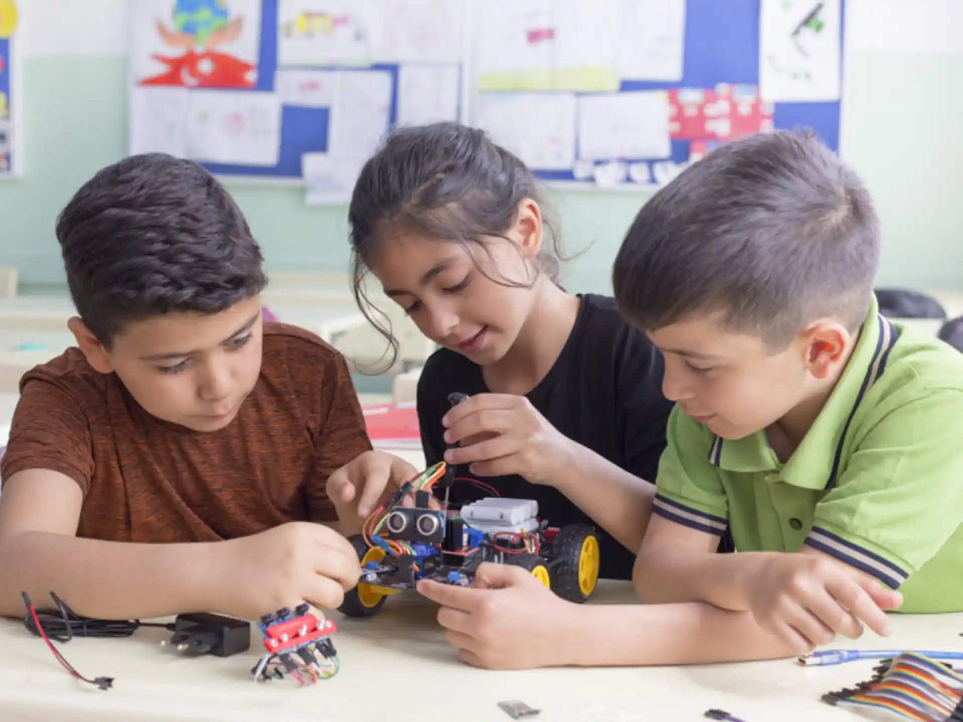 a group of children playing with a toy