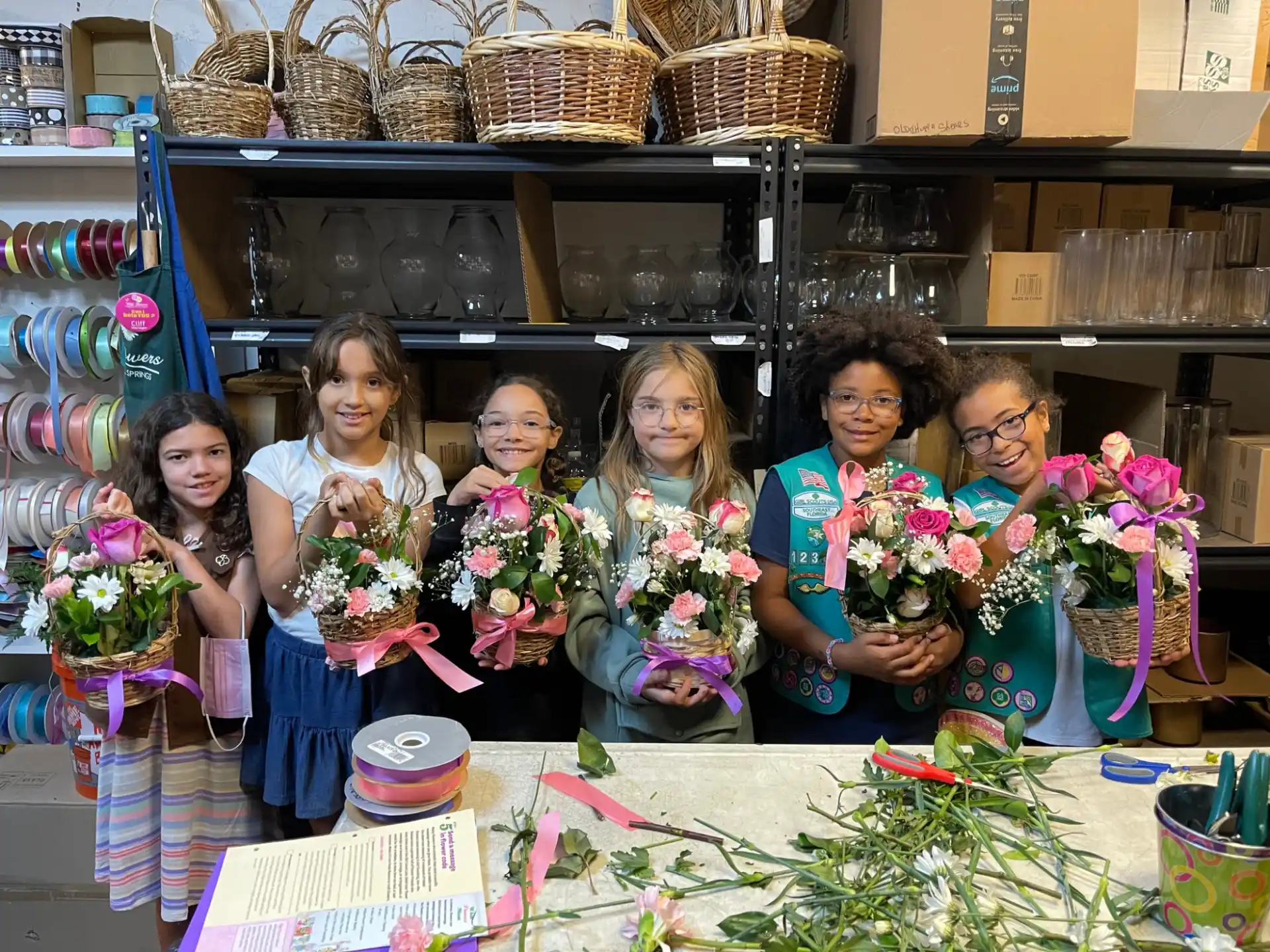 a group of people holding flowers