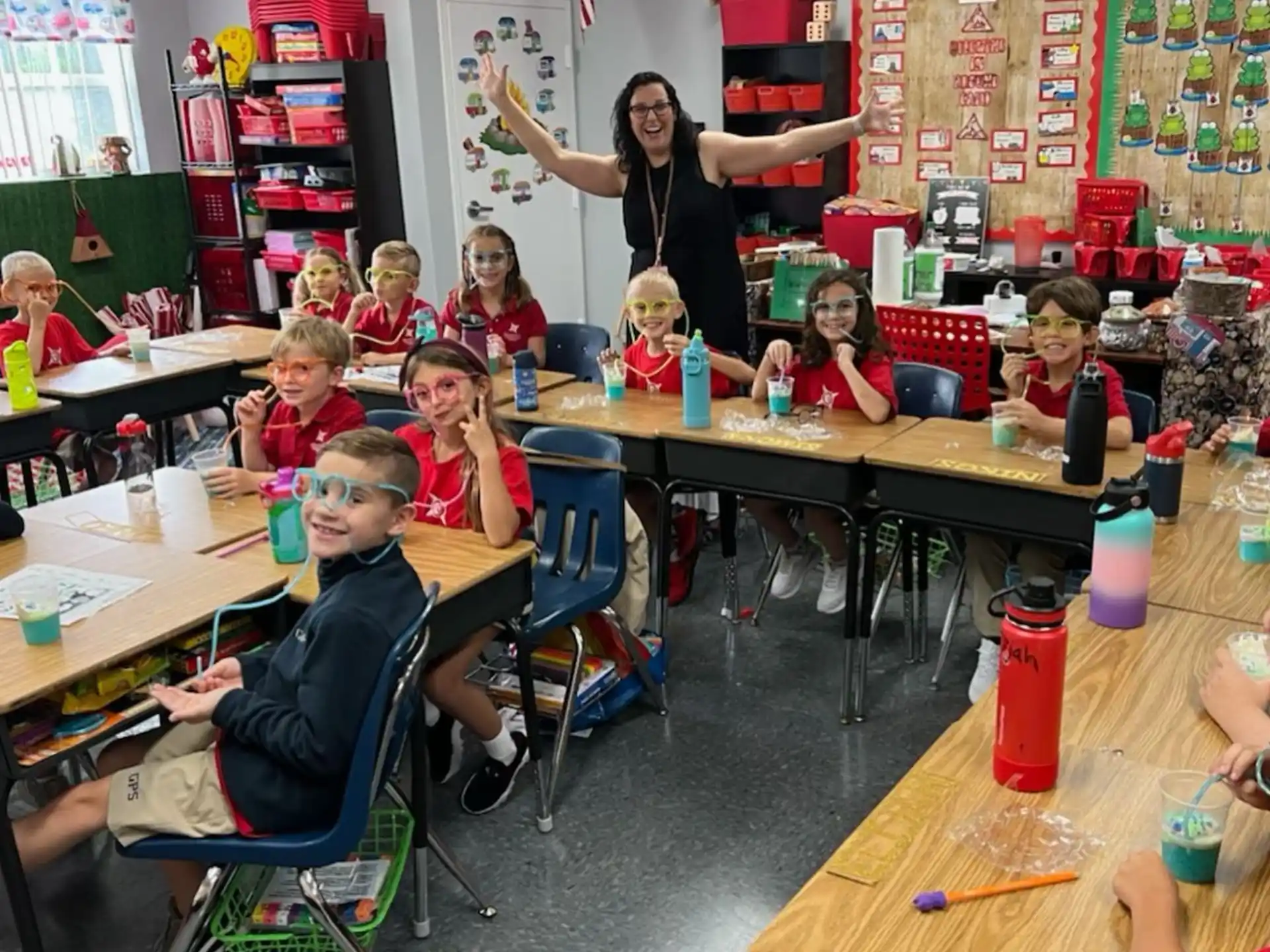 a person teaching children in a classroom