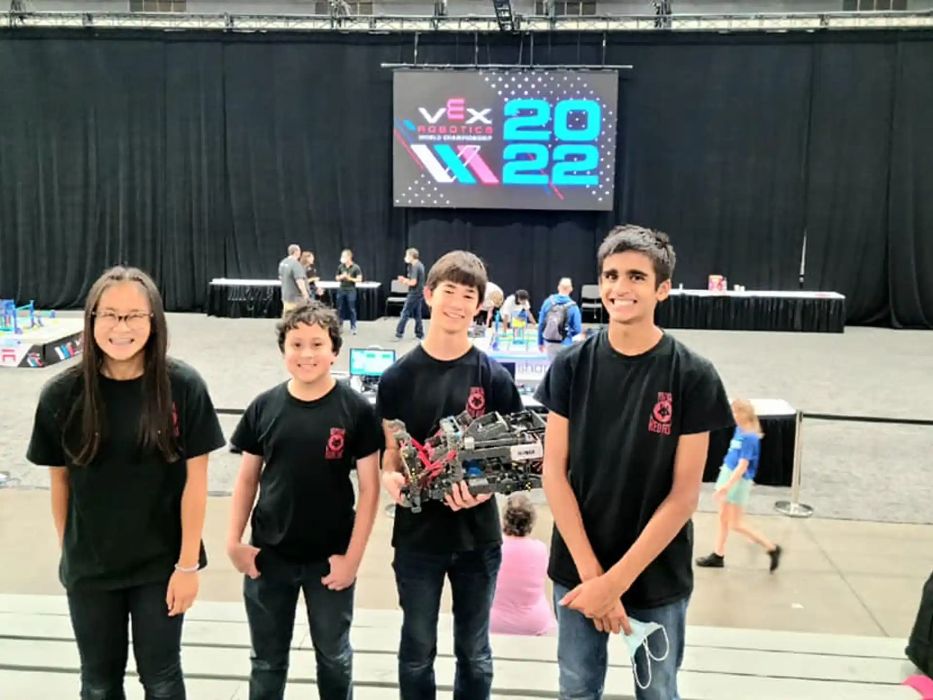 a group of people standing on a stage