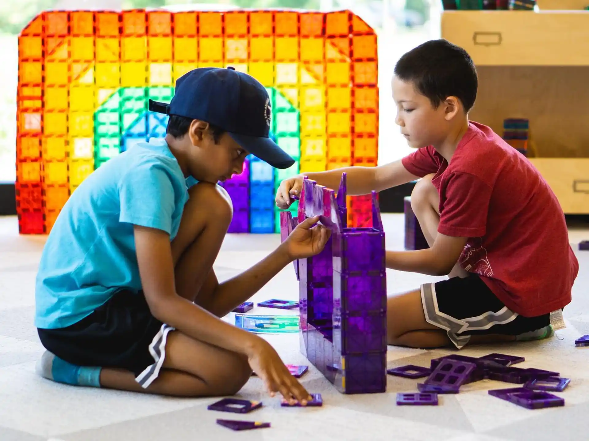 a few young boys playing with toys