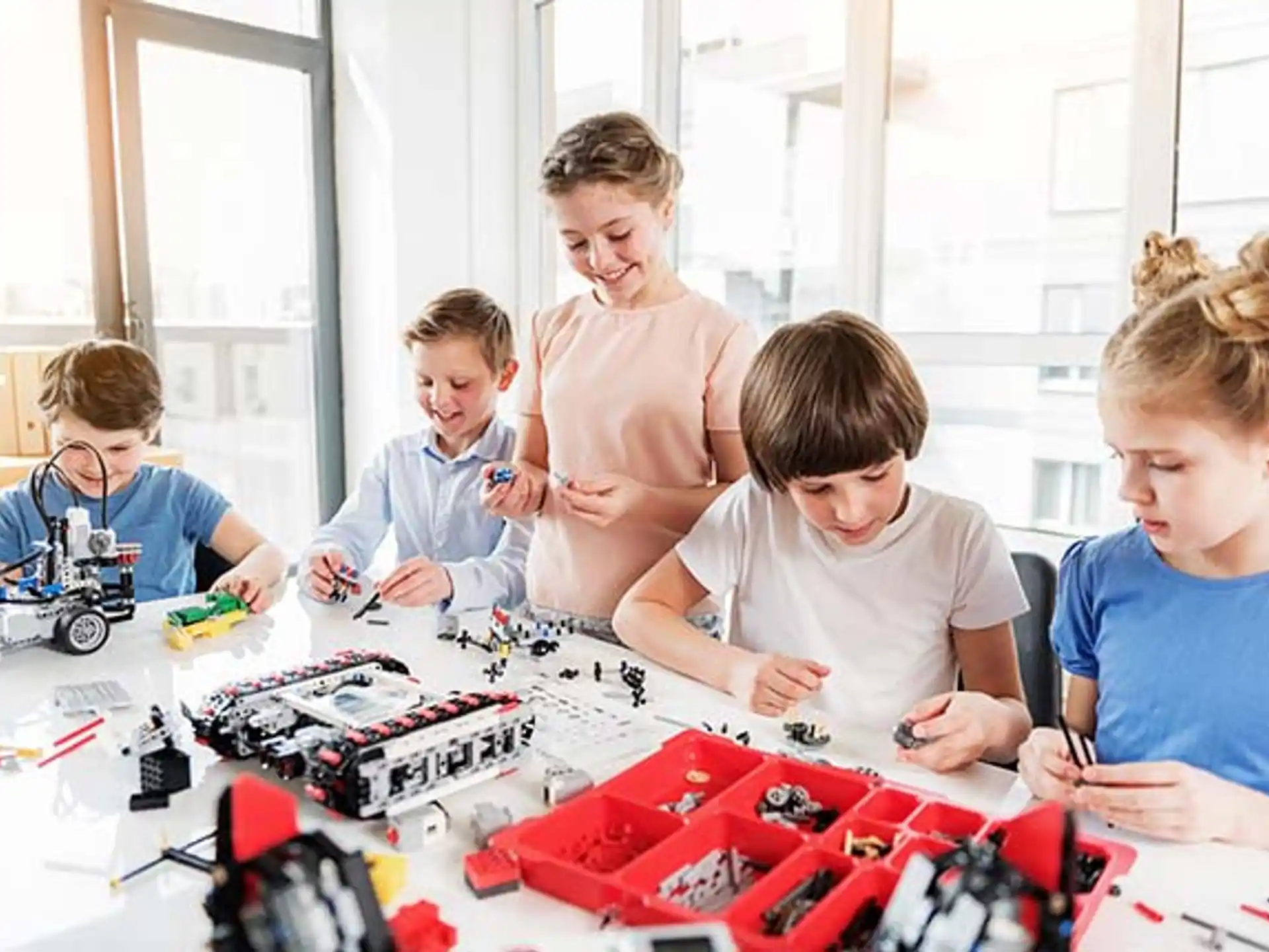 a group of kids playing a board game