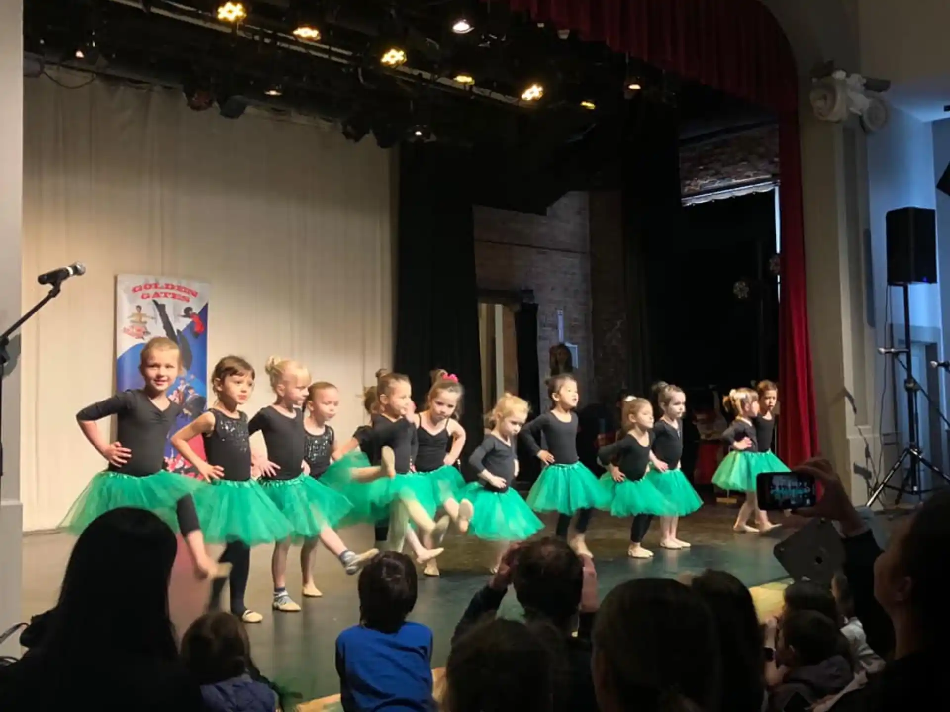 a group of people performing on a stage