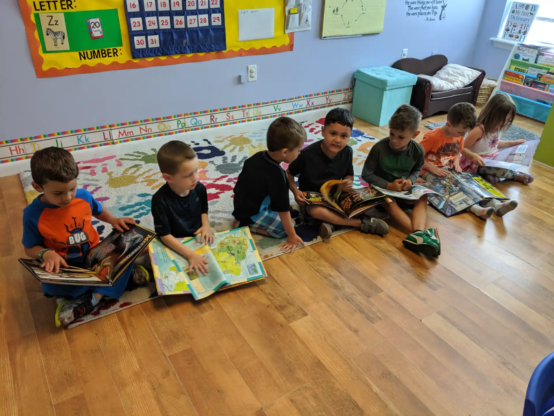 a group of children sitting on the floor
