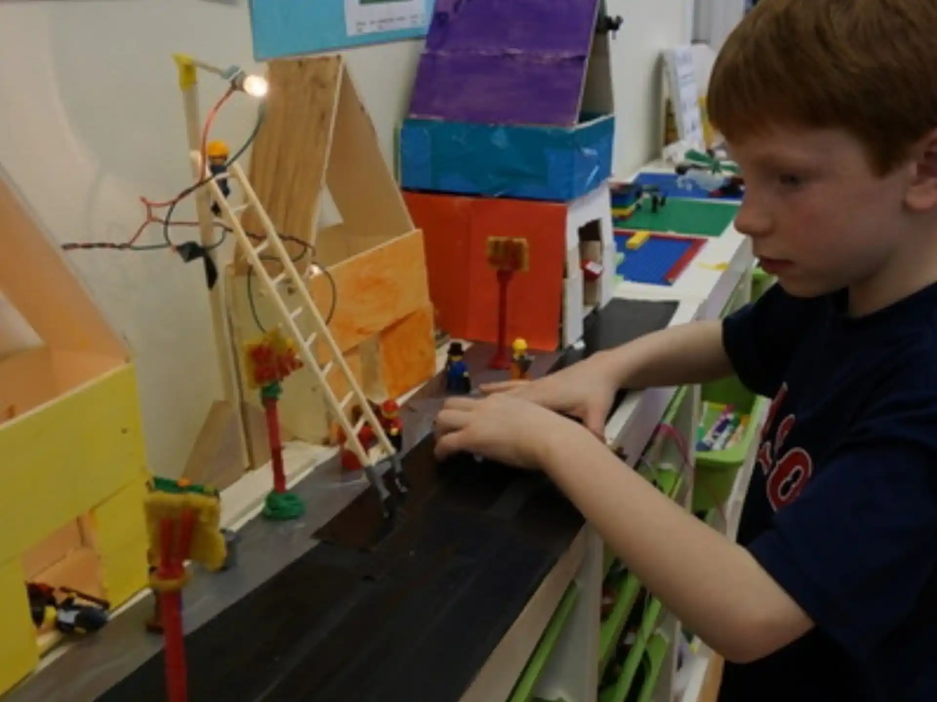 a boy playing with toys