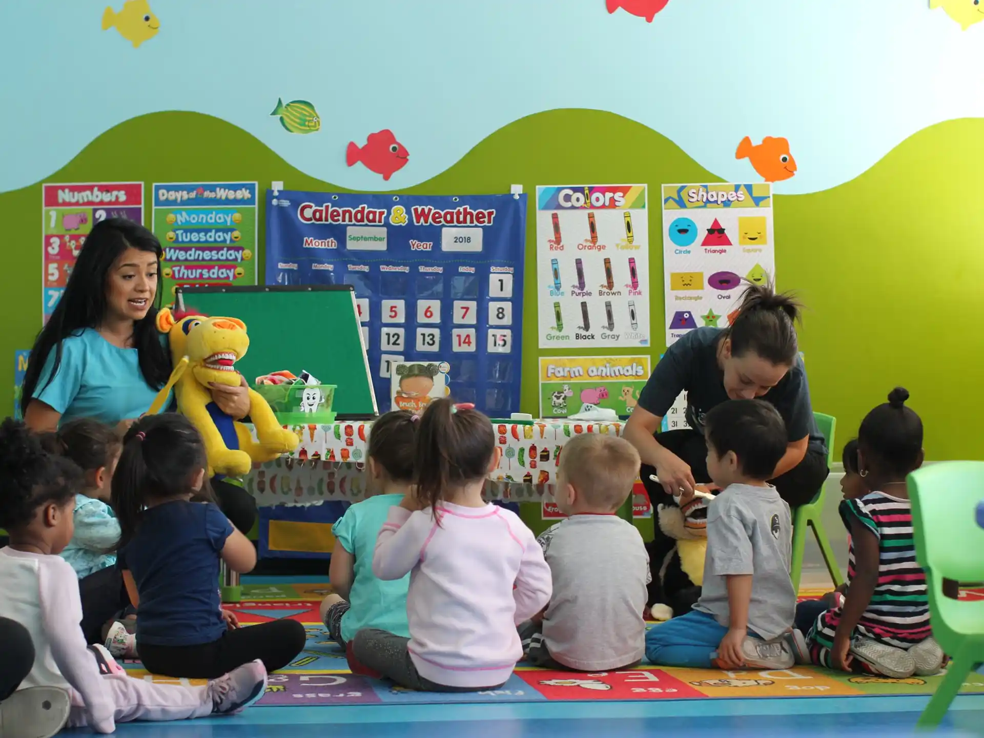 a group of children sitting on the floor