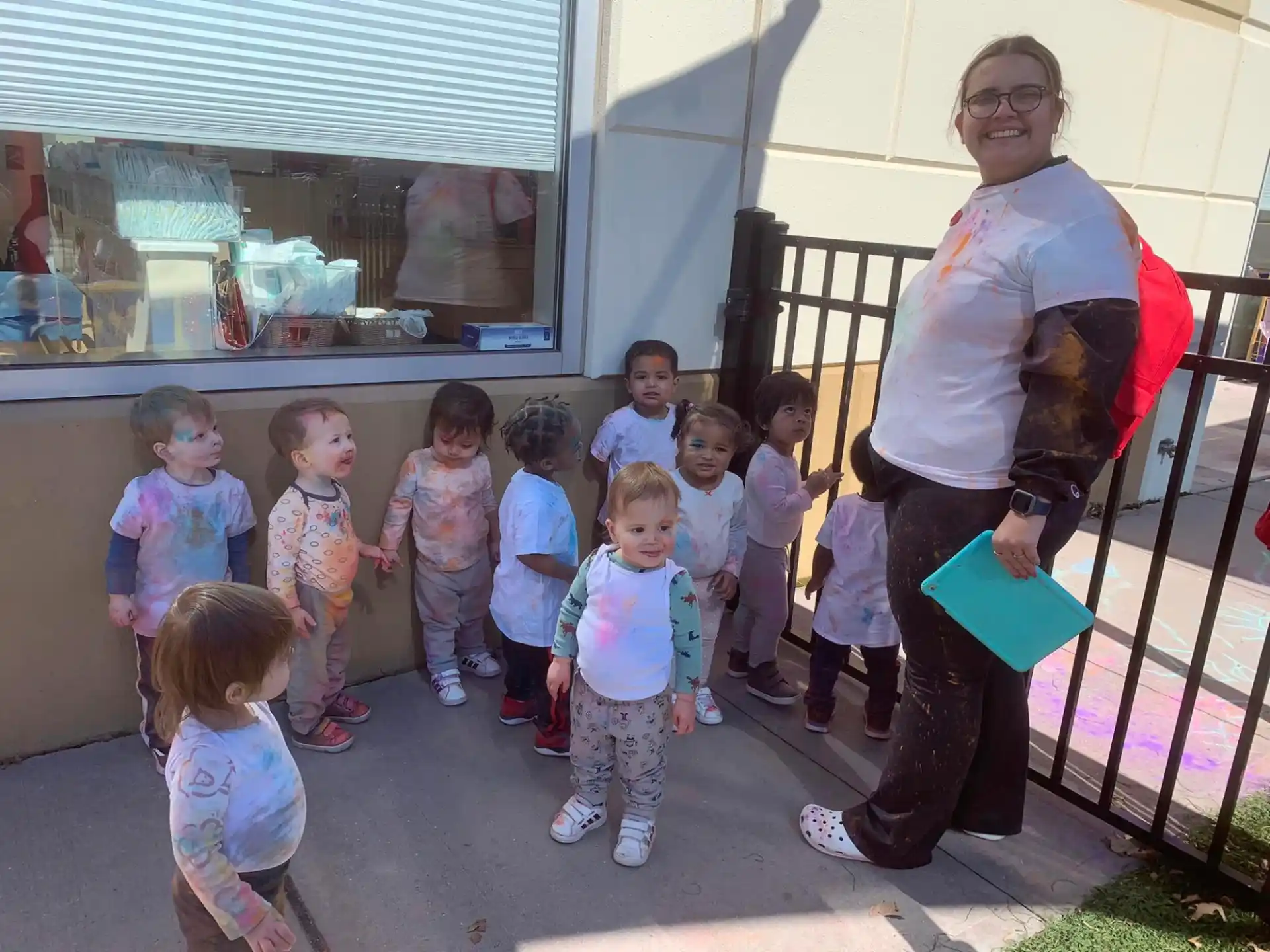 a person and a group of children