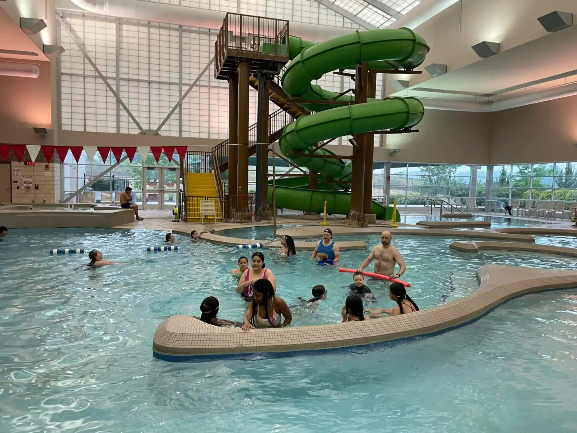 a group of people in a pool