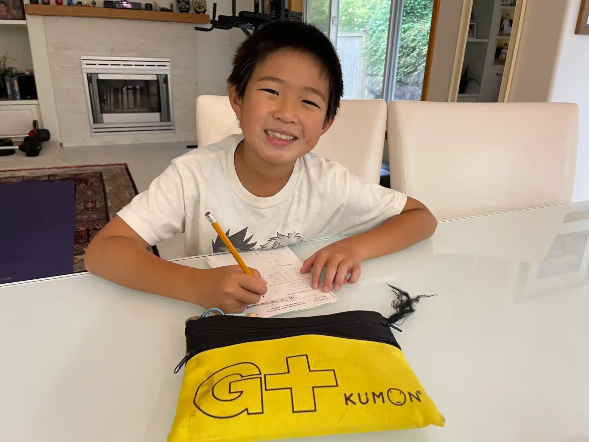 a boy sitting at a table