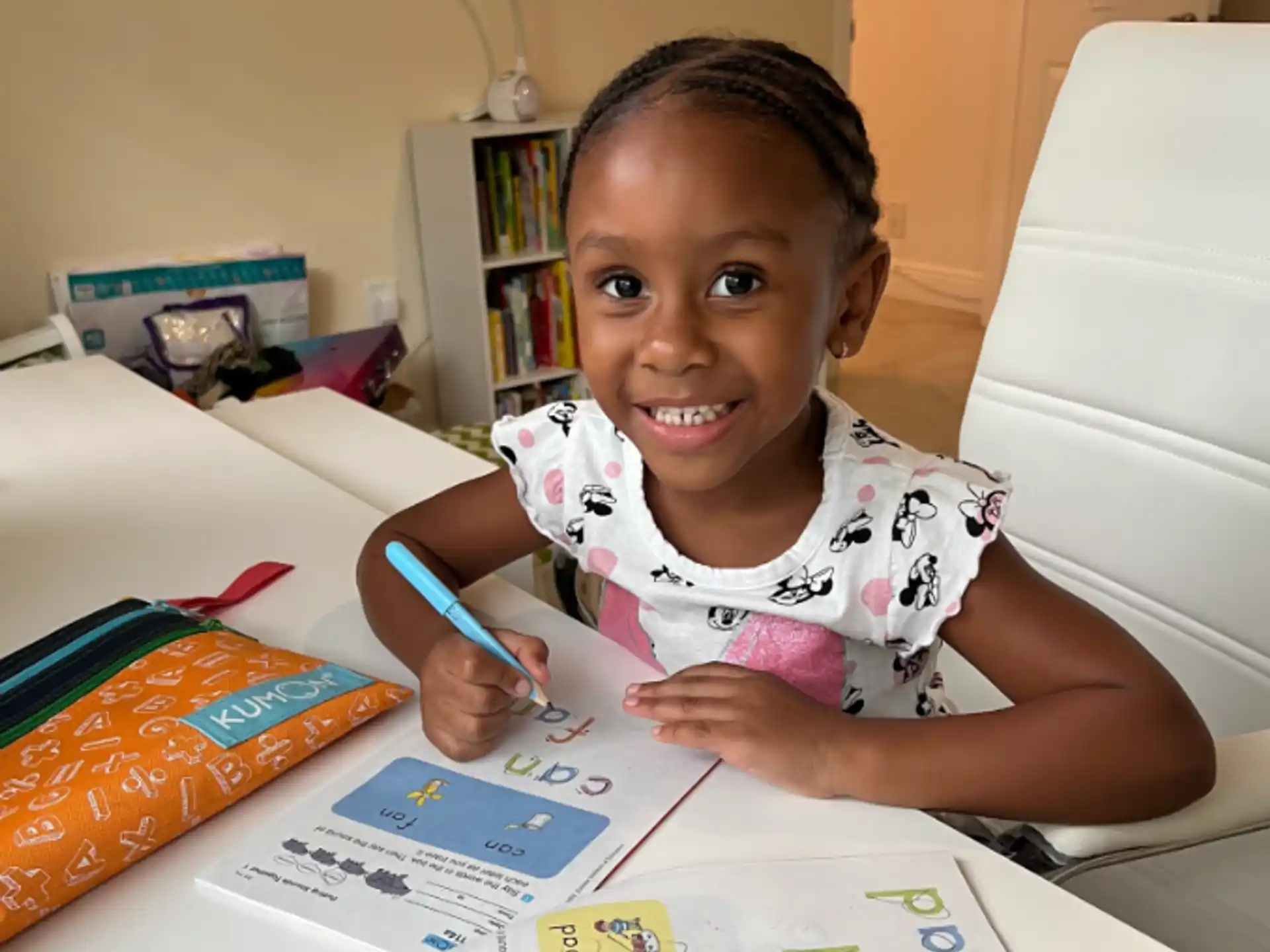 a child sitting at a table