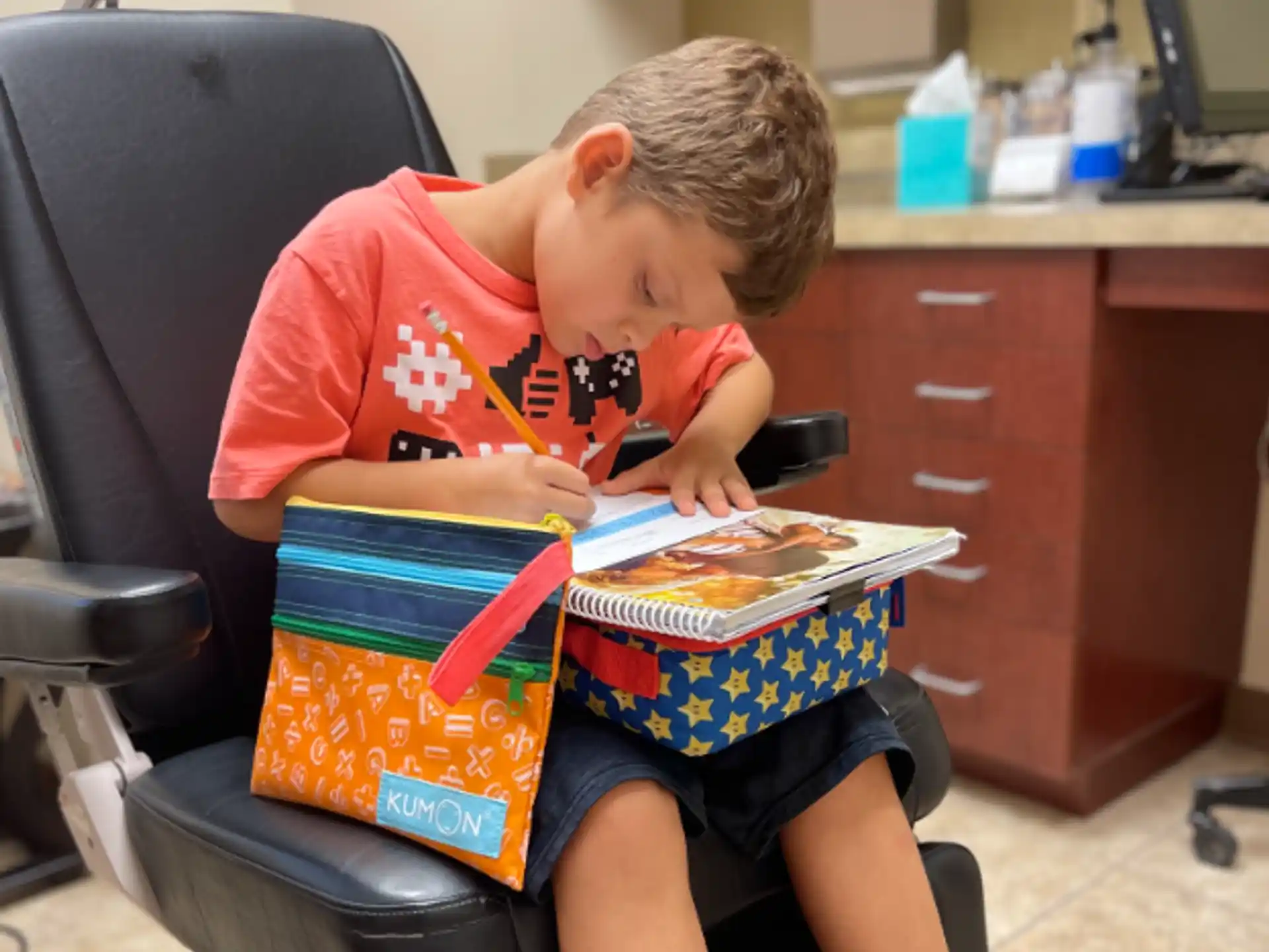 a boy reading a book