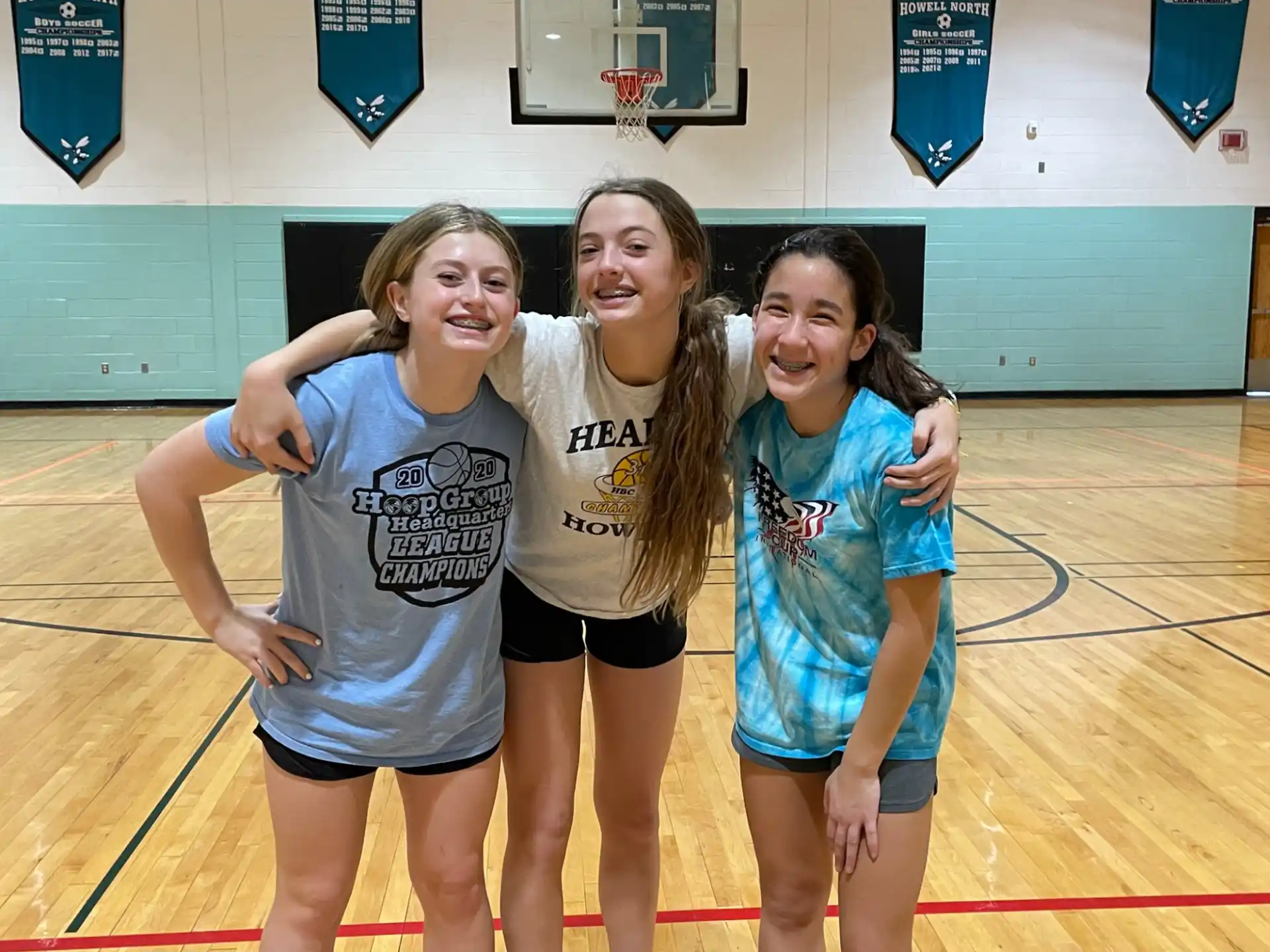 a group of girls posing for a picture