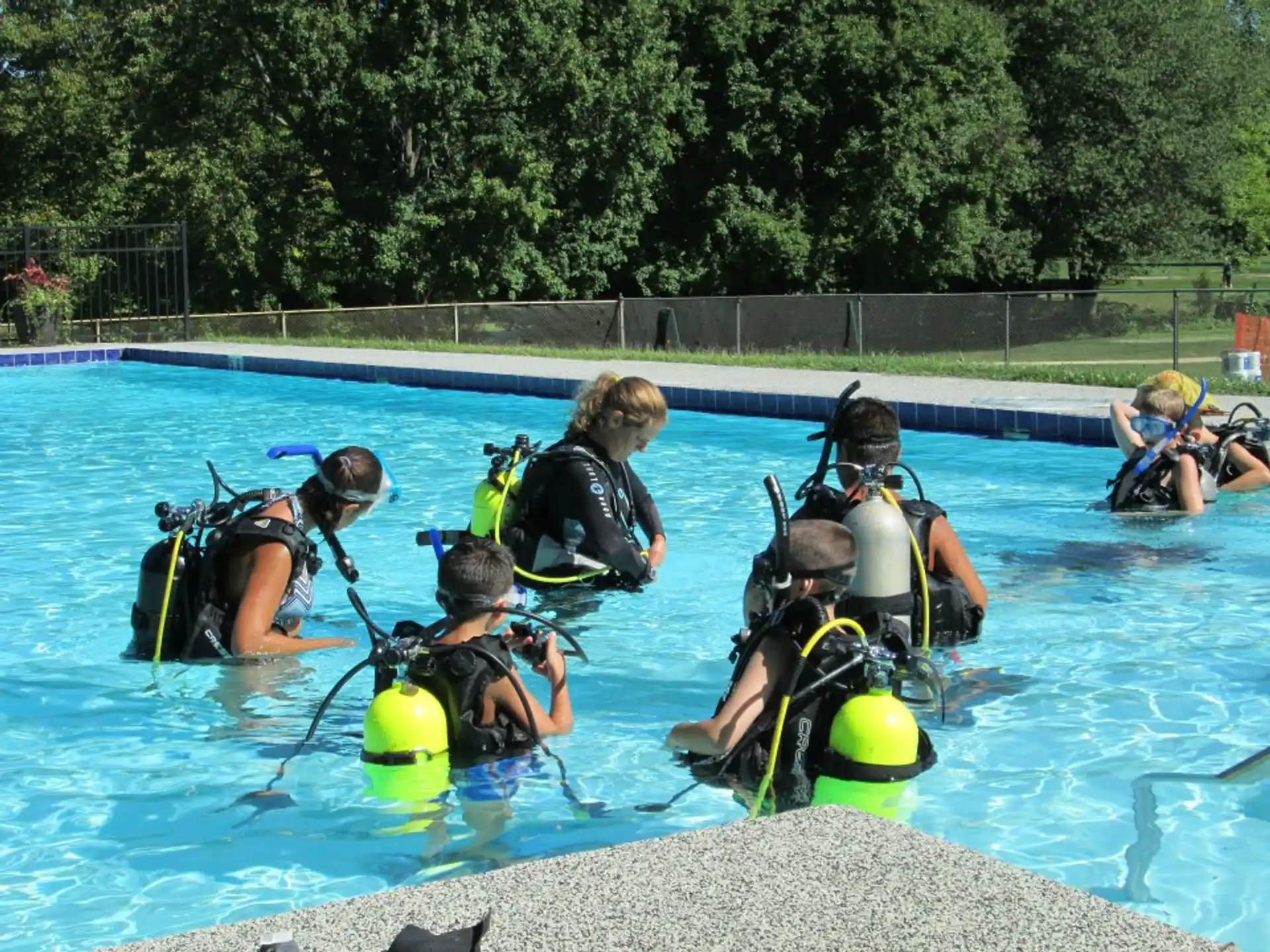 a group of people in a pool