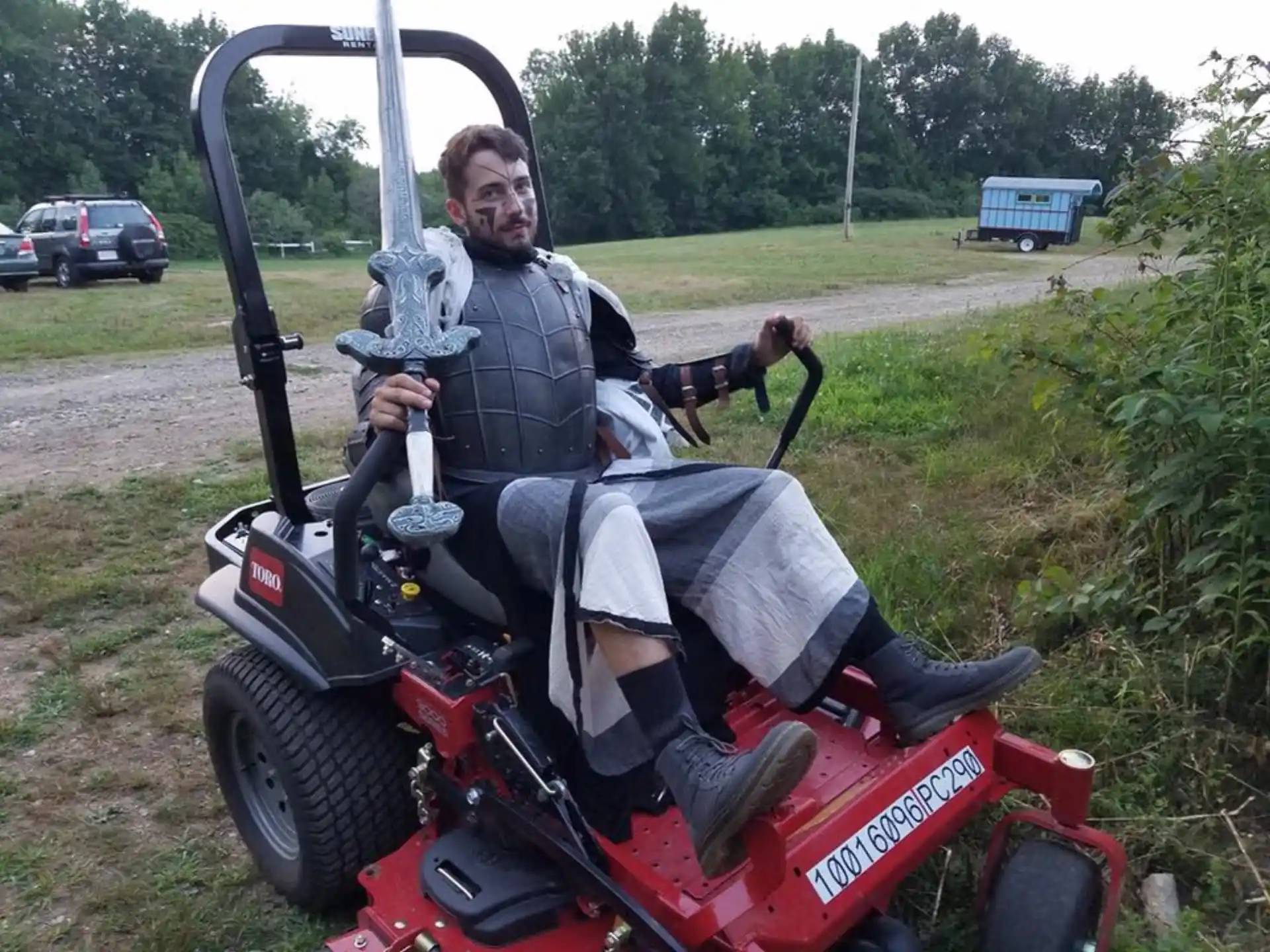 a man on a red atv