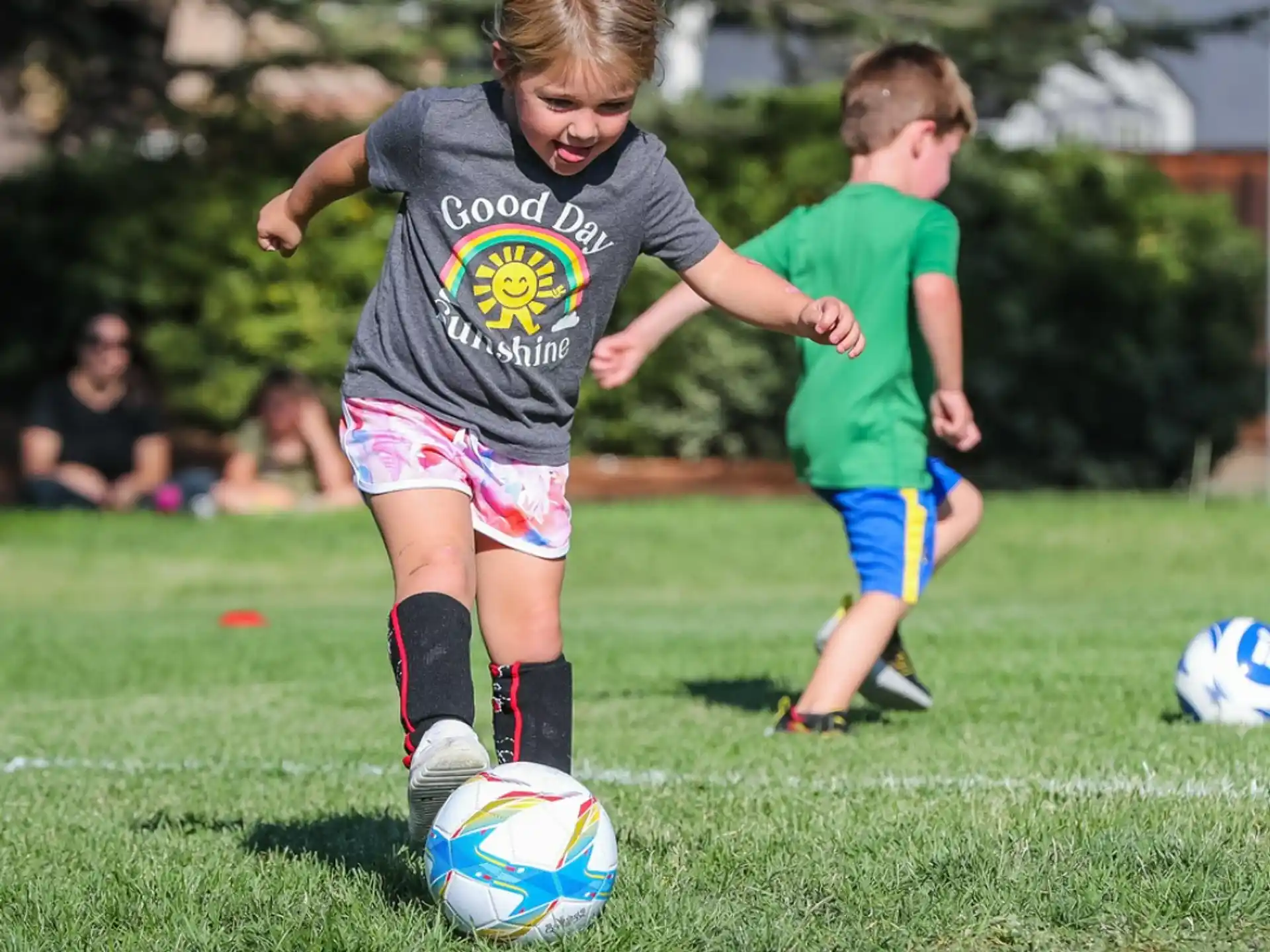 kids playing football on a field