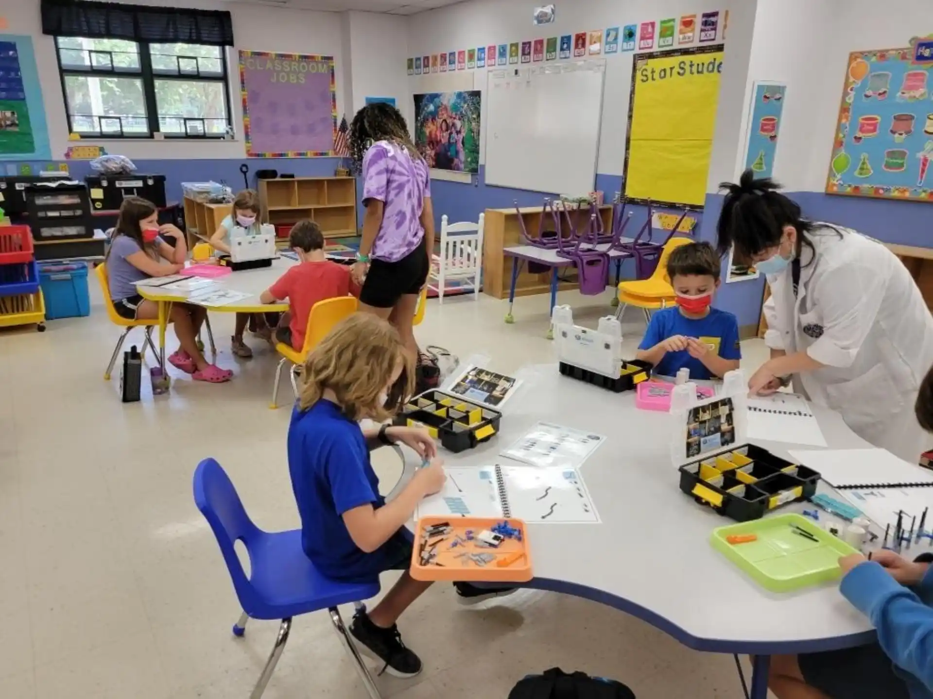 a group of children in a classroom