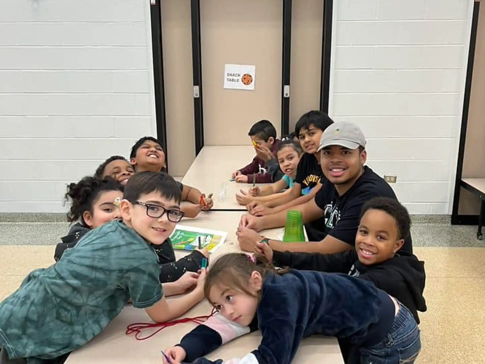 a group of people sitting on the floor