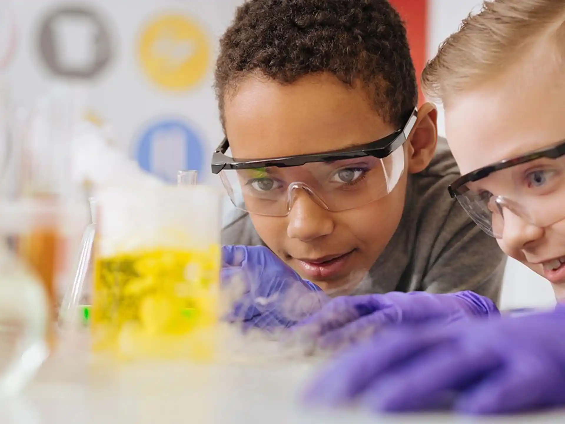 a couple of kids wearing glasses