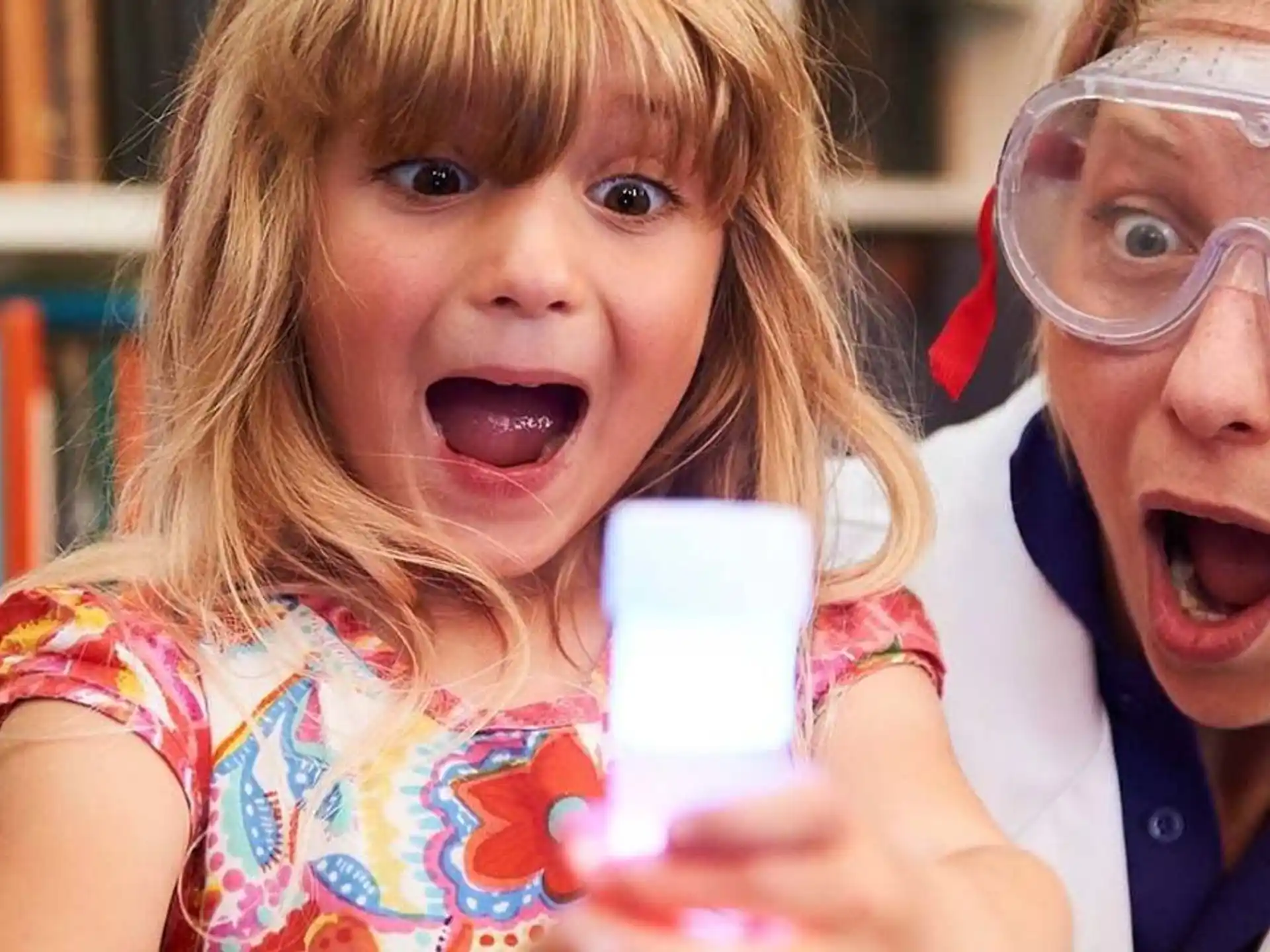 a person and a girl with their mouths open