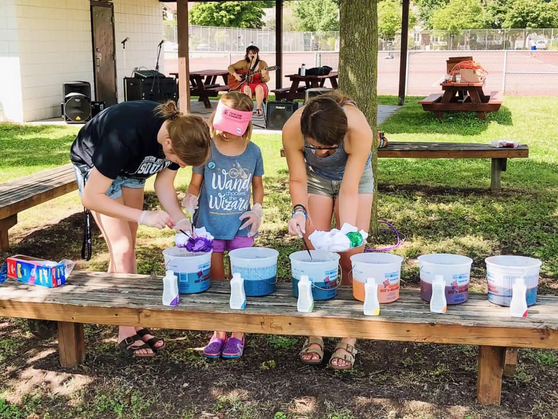 a group of people working outside