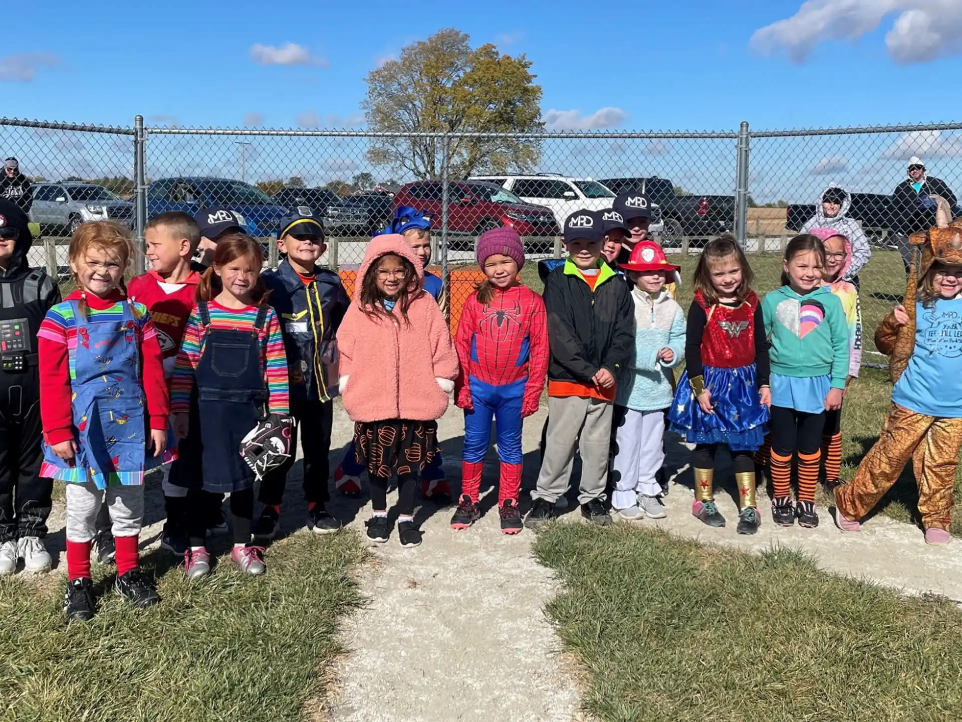 a group of children posing for a photo