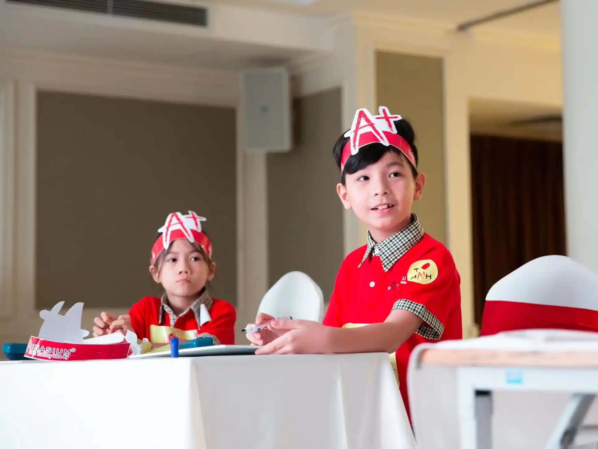 a couple of kids in uniform