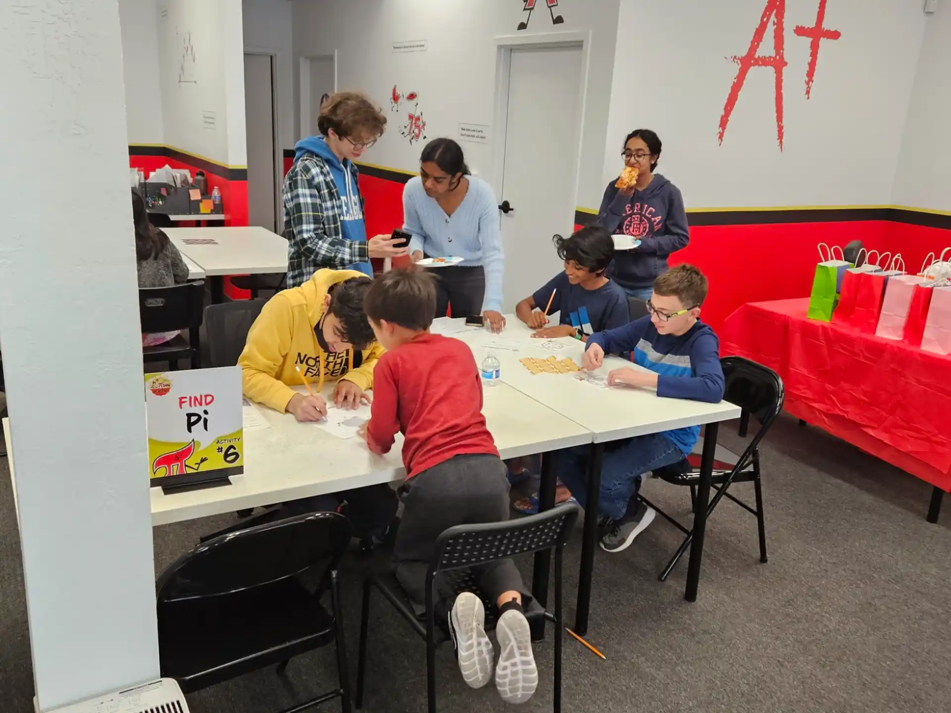 a group of people sitting at a table
