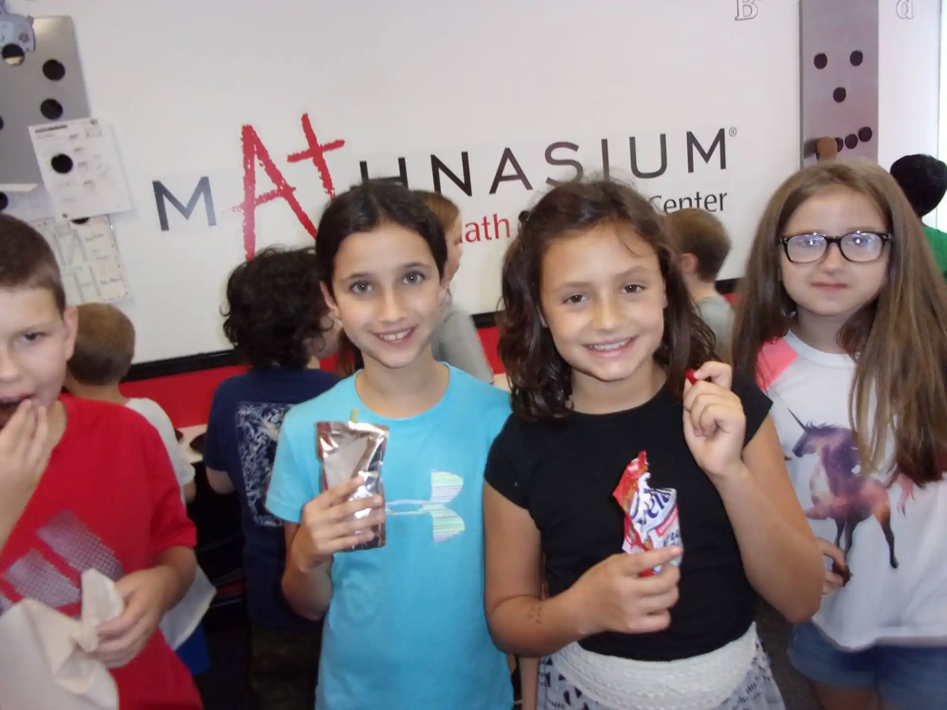a group of children posing for a photo