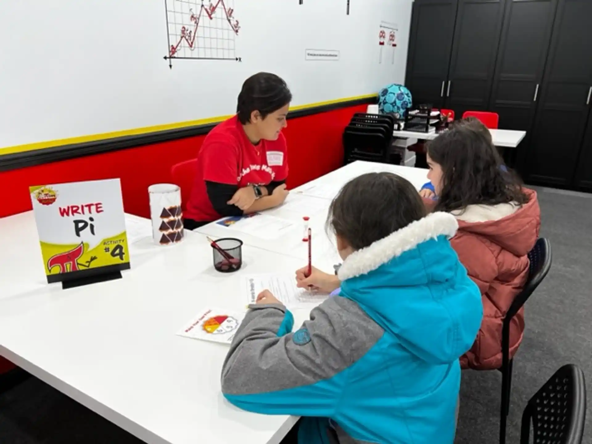 a group of people sitting at a table