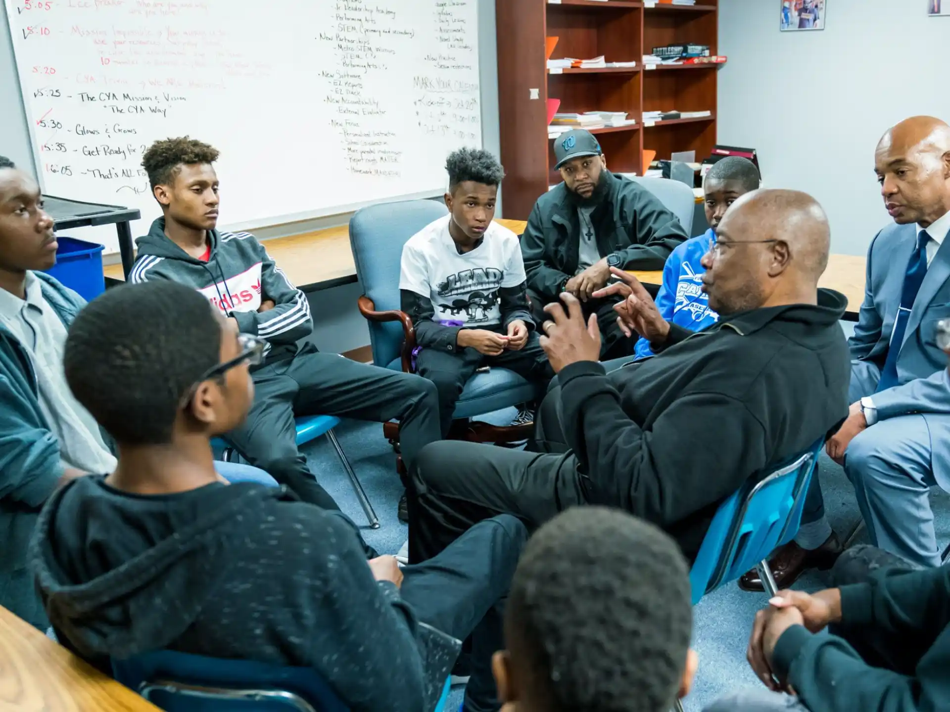 a group of people sitting in a room