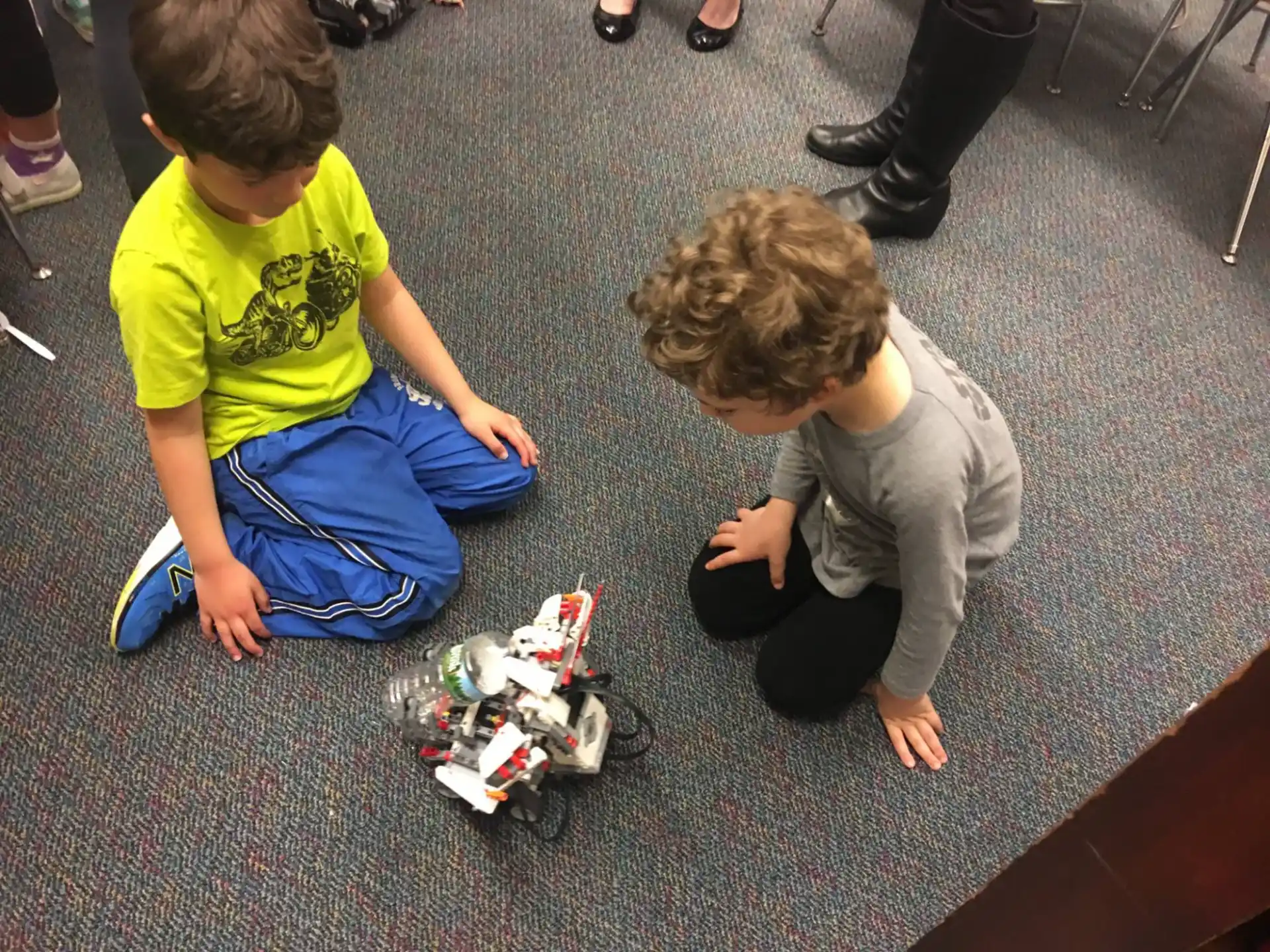 a couple of kids playing with toys