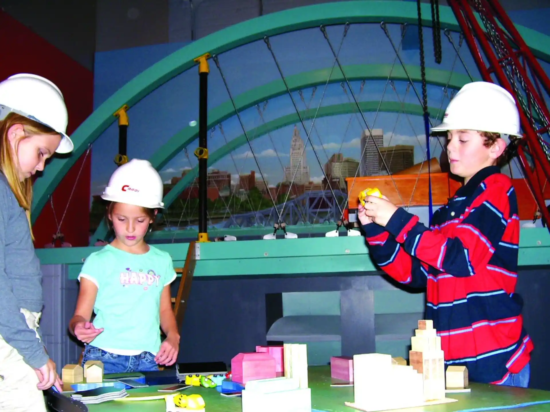 a group of people wearing hard hats