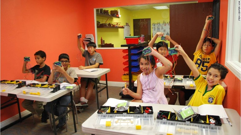 a group of children in a classroom