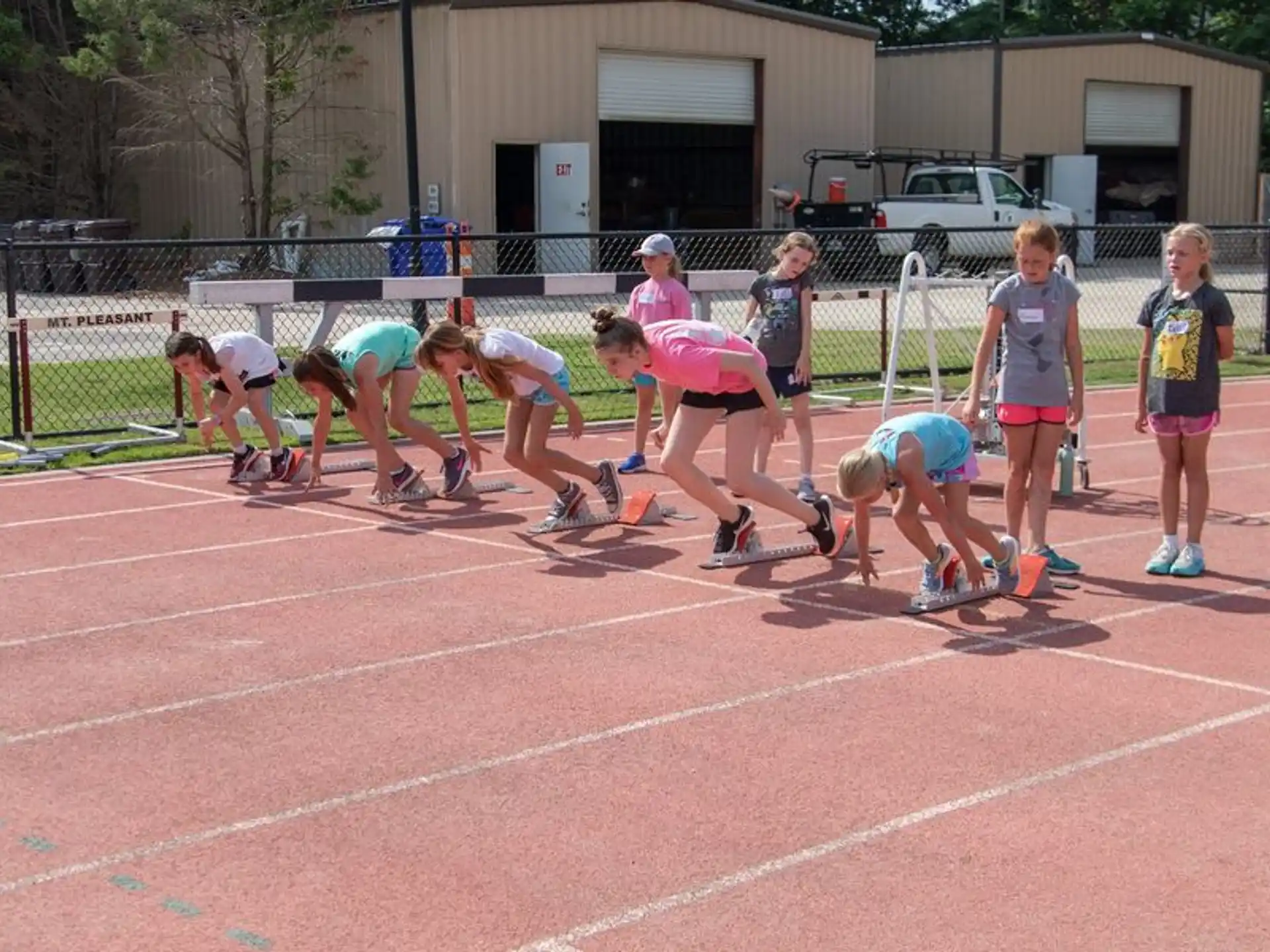 a group of people on a track