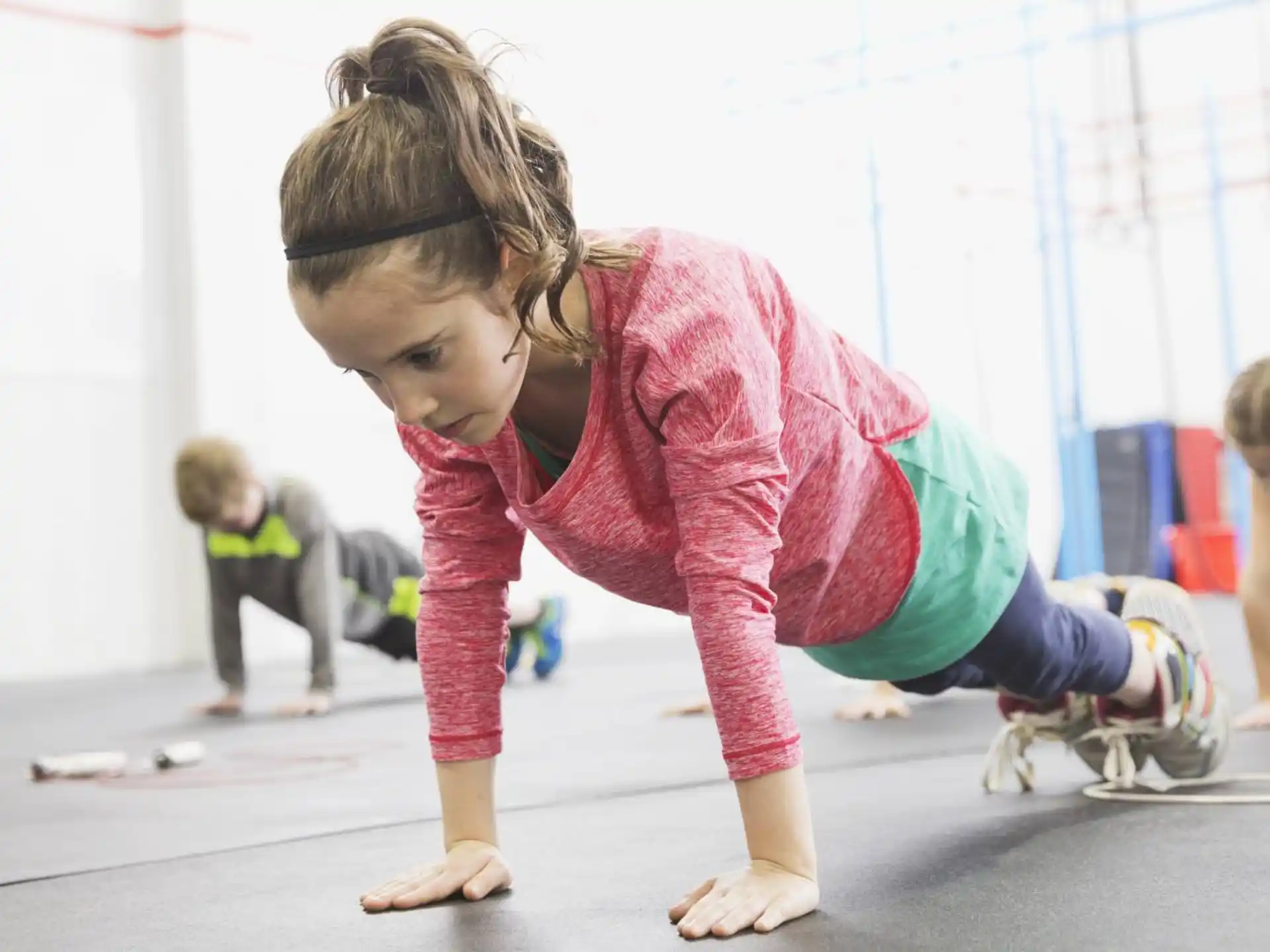 a group of people doing push ups
