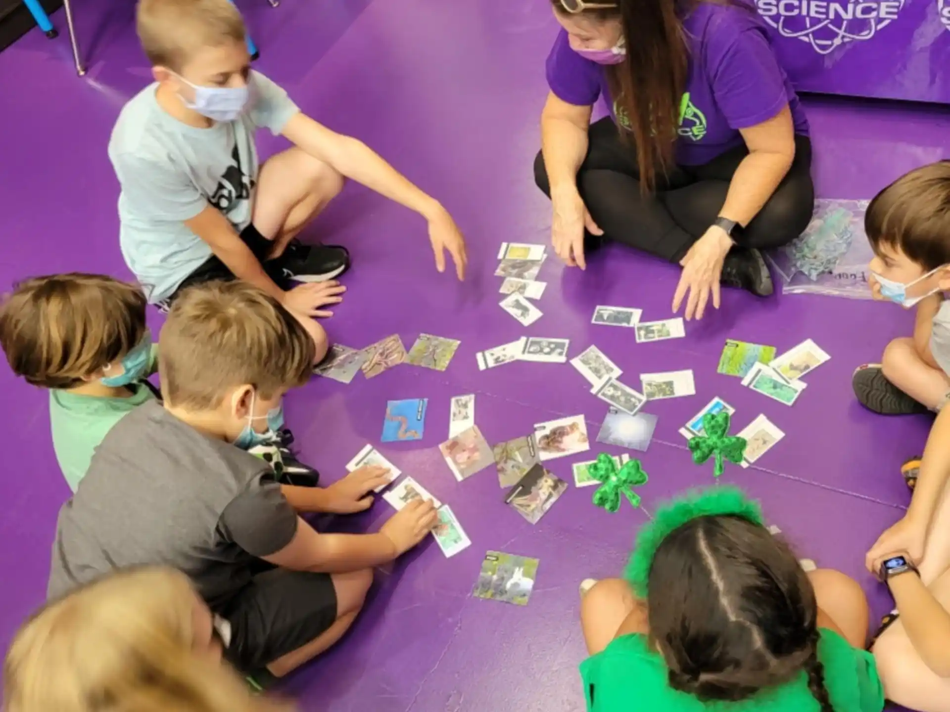 a group of people playing a board game
