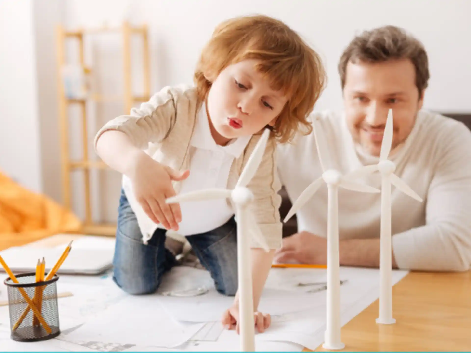 a person and a child painting