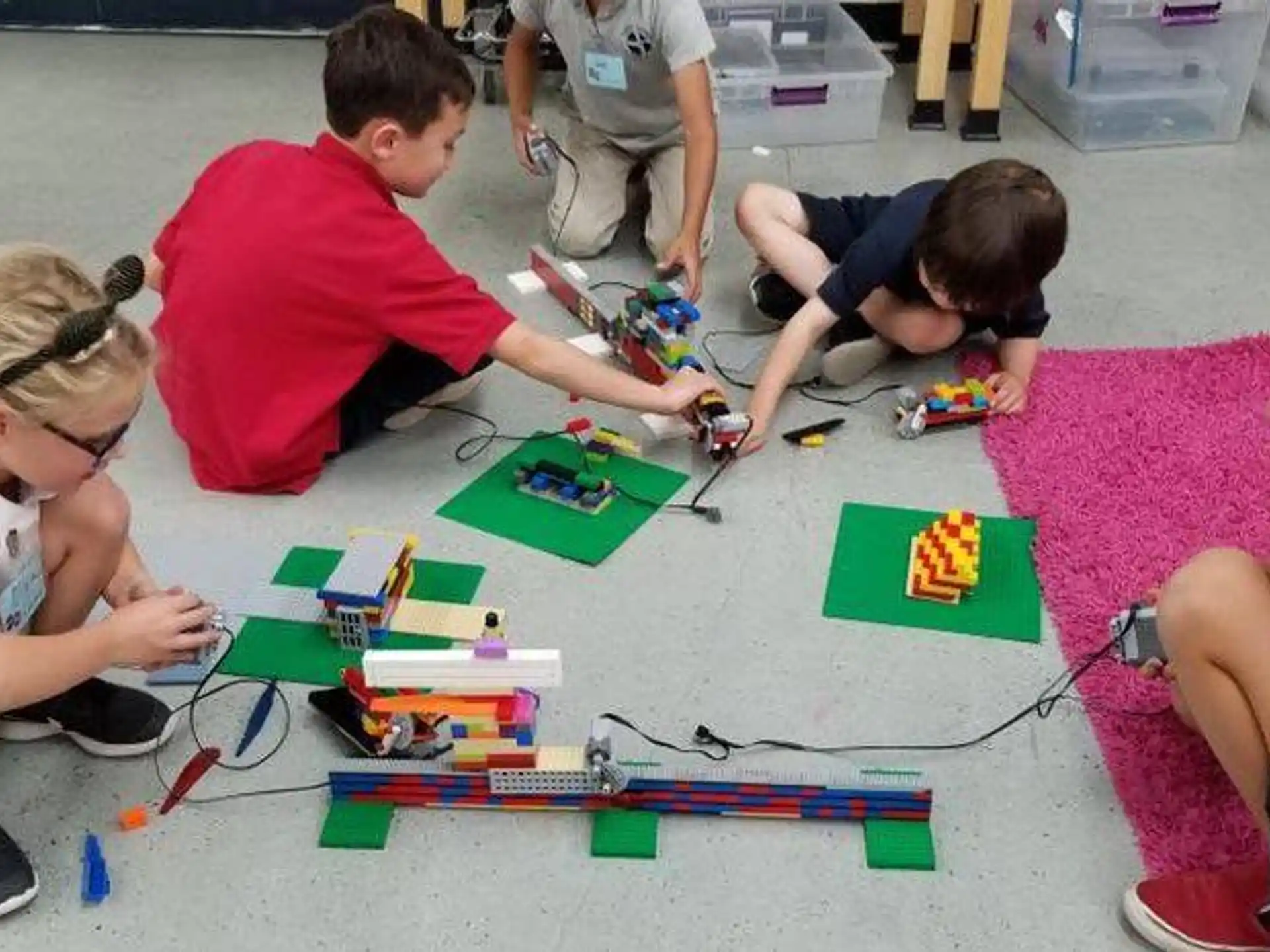 a group of children playing with toys