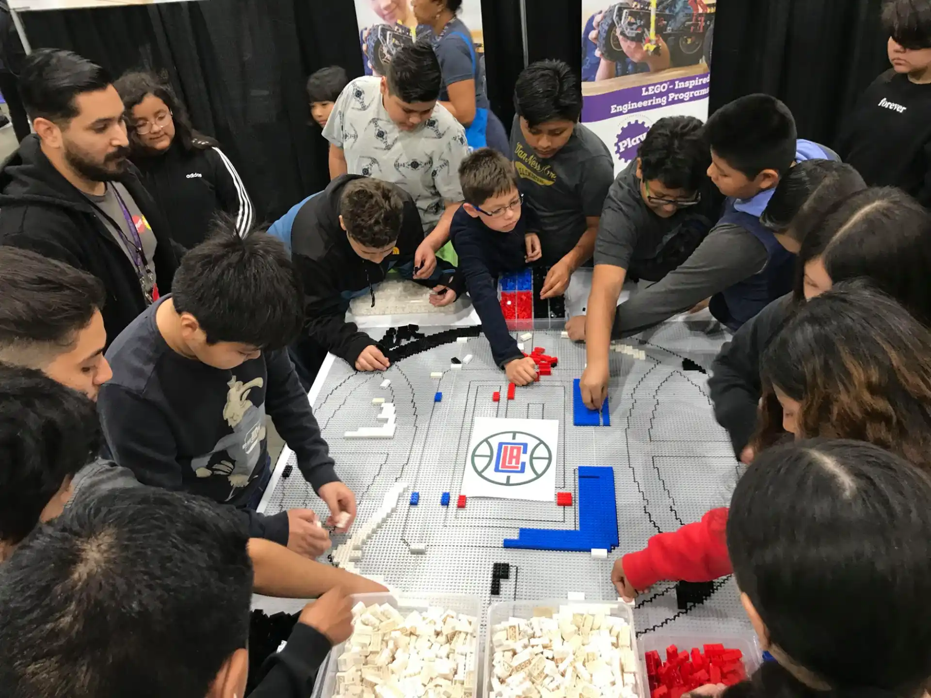 a group of people playing a board game