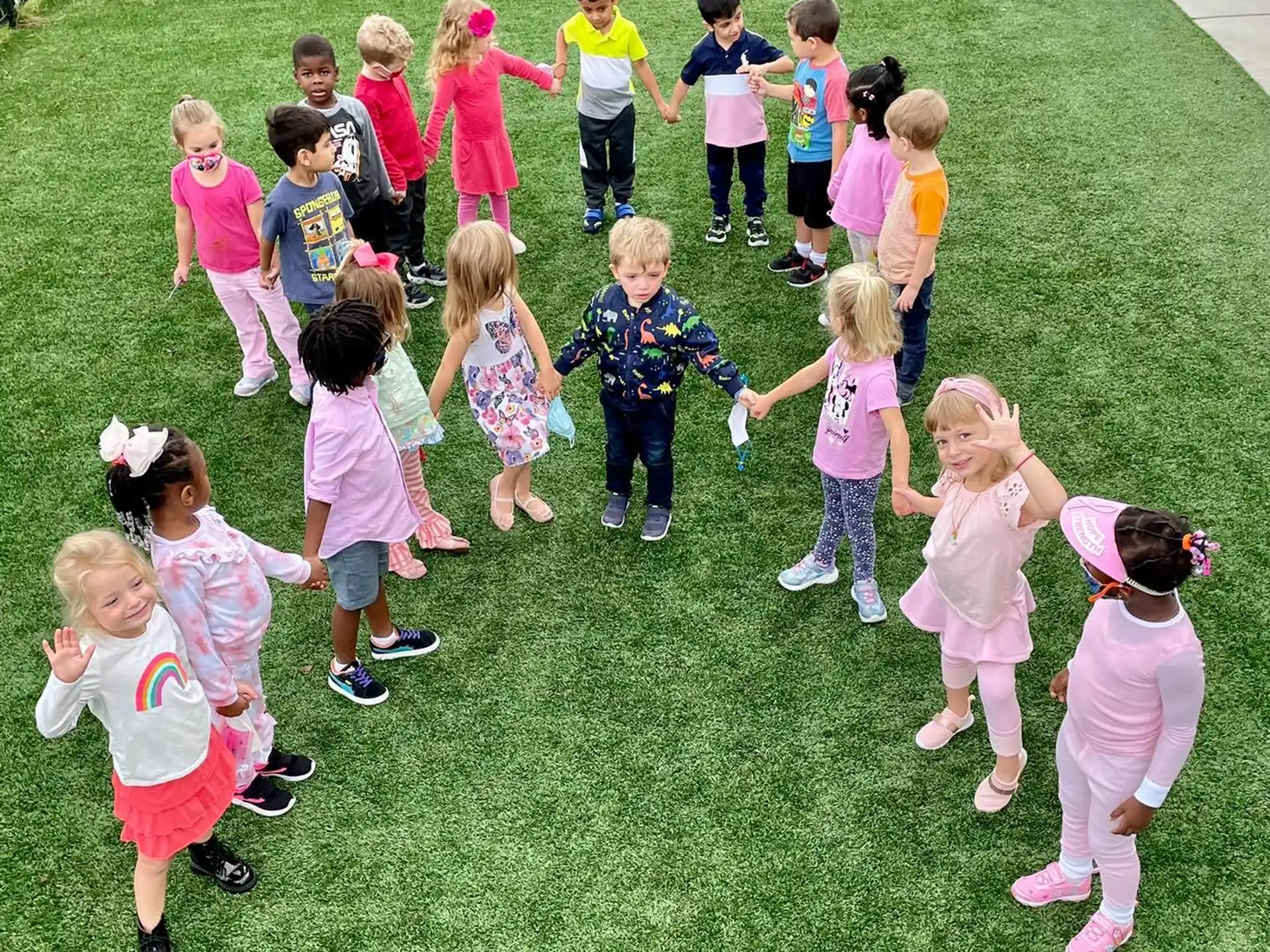 a group of children in a field