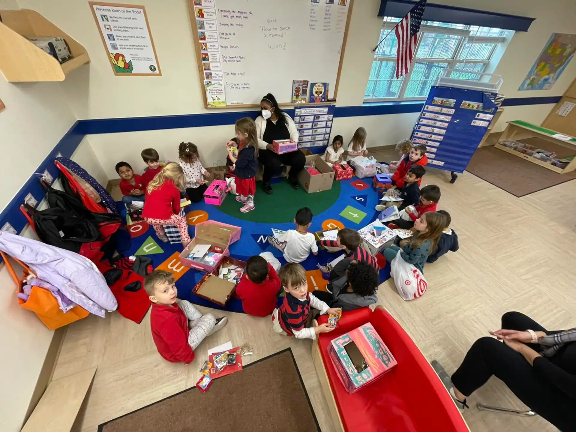 a group of children sitting in a classroom