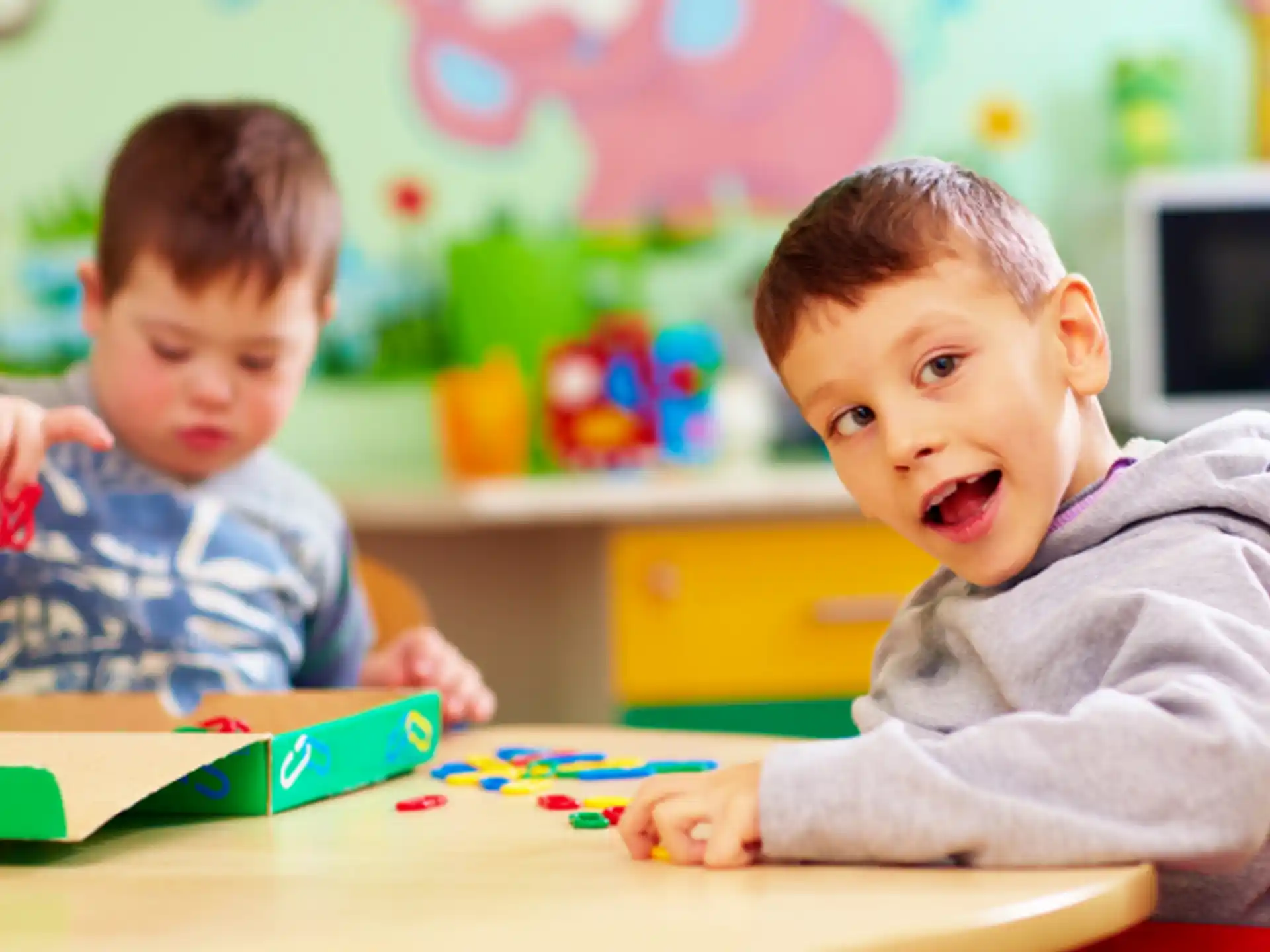a couple of boys playing with toys