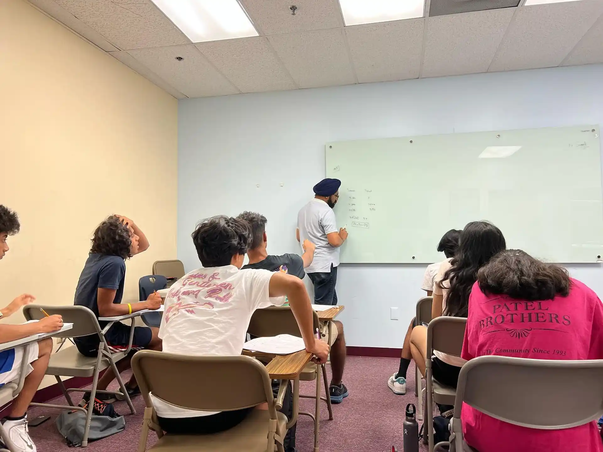 a group of people in a classroom
