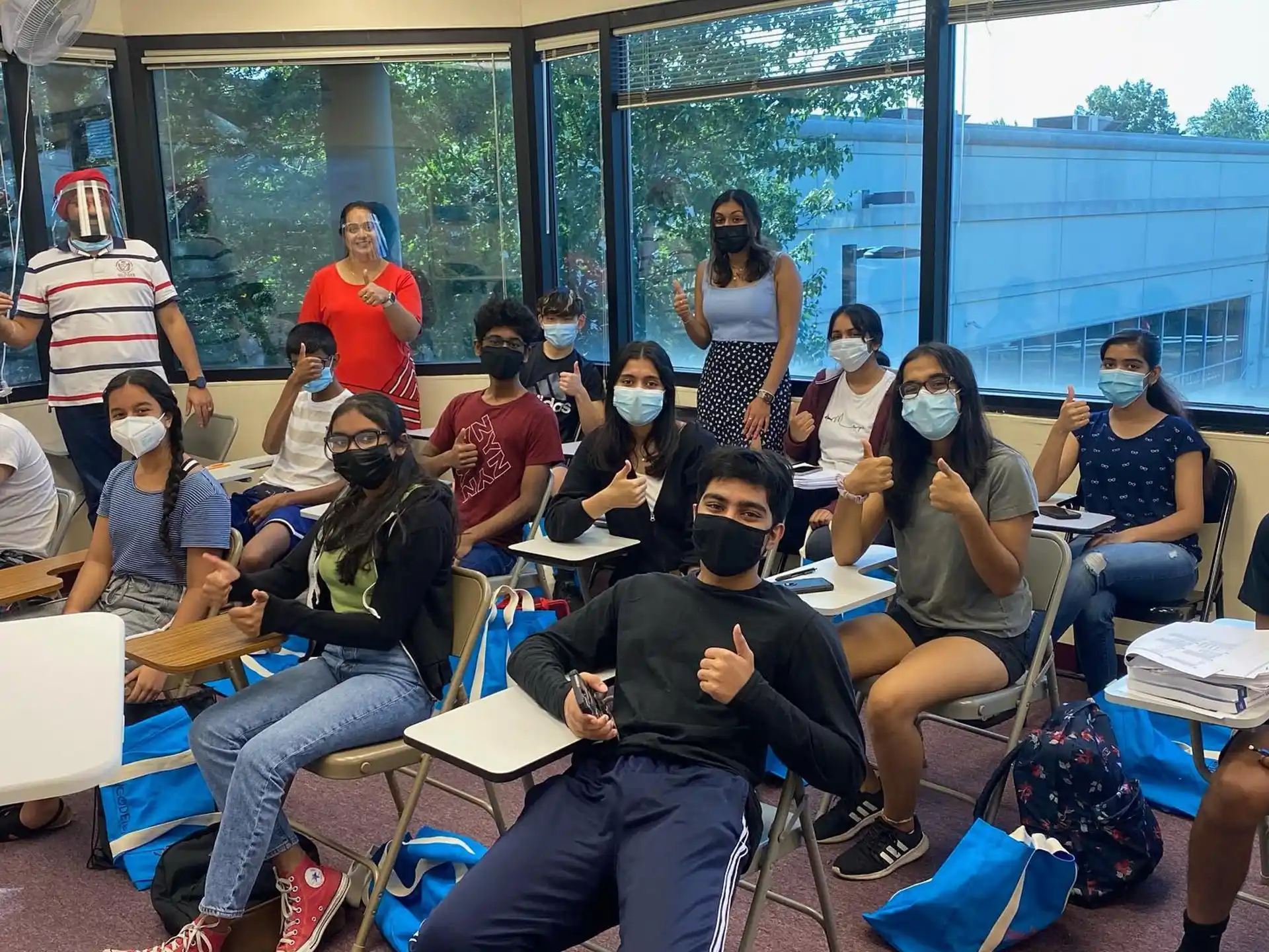 a group of people sitting in a room