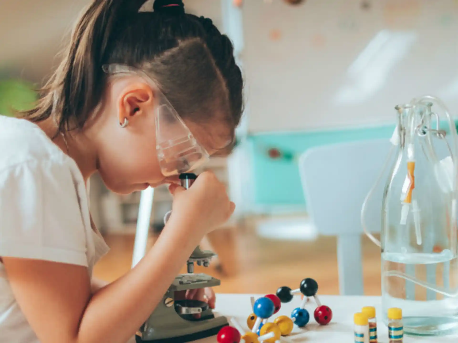 a person using a microscope