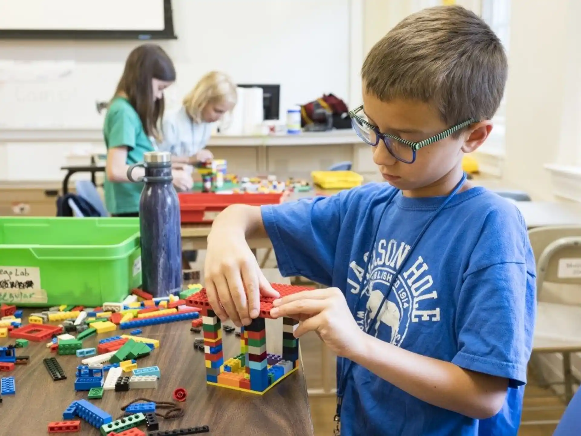 a boy playing with toys