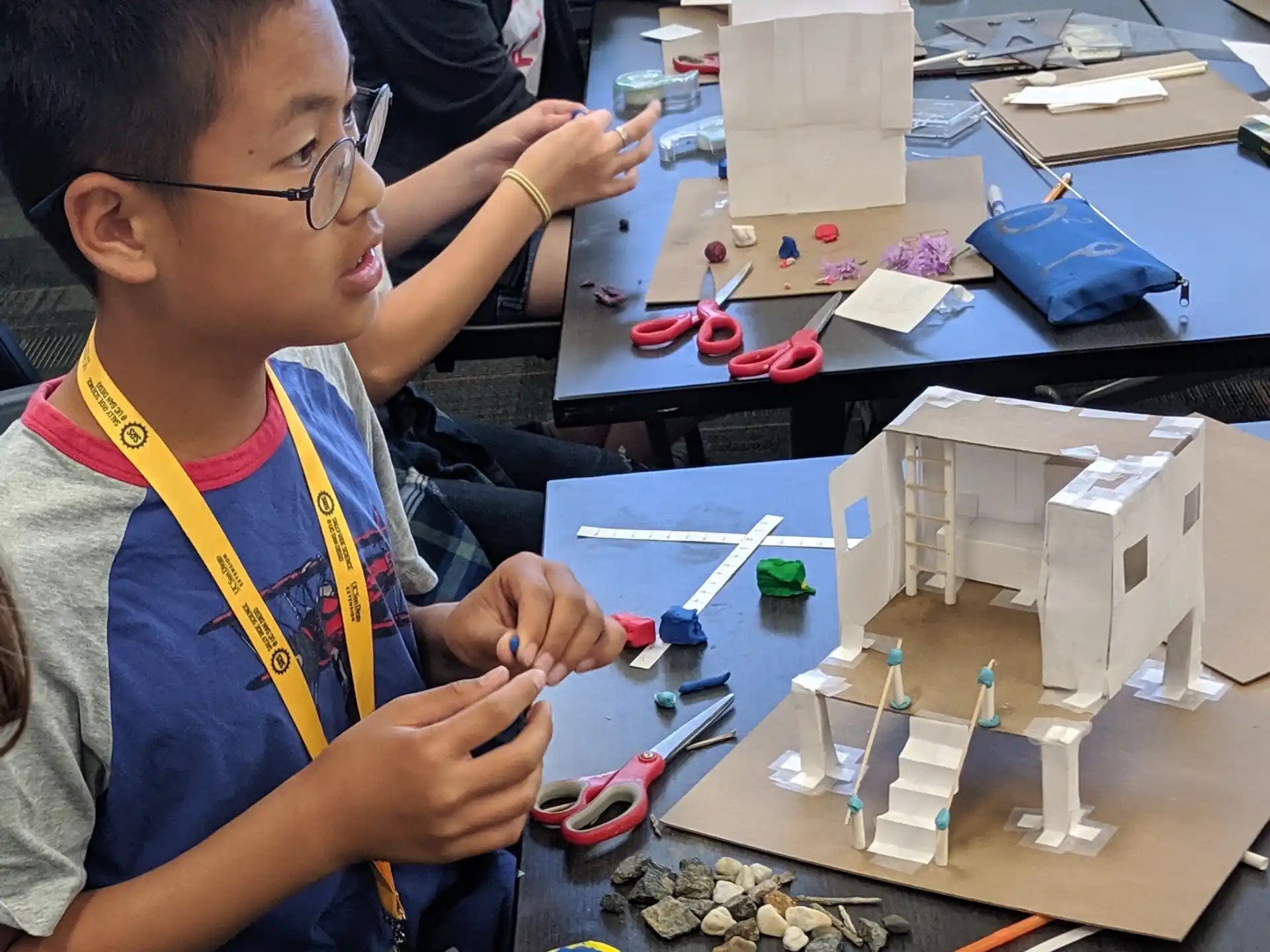 a young boy working on a project